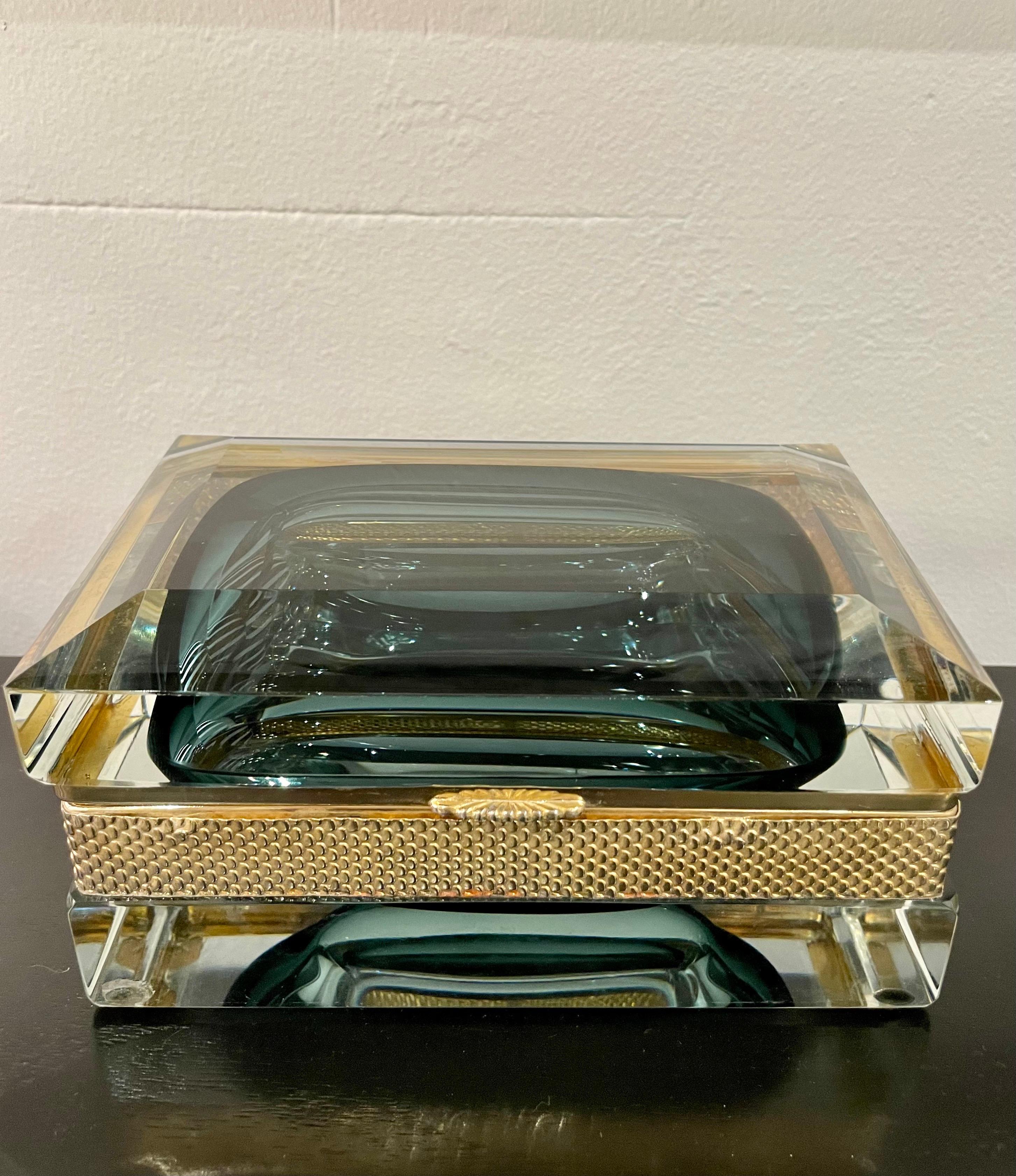 This is a very rare faceted Murano Glass brass mounted box by Alessandro Mandruzzato in an exquisite soft blue hue. Shimmers and shines from ALL angles, truly a show stopper!