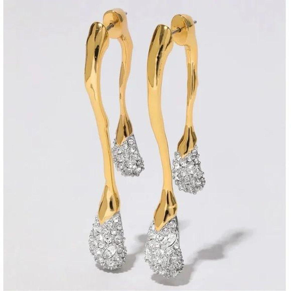 Simply Beautiful! Front to back Alexis Bittar Designer Silhouette Earrings. Designed with 14k Gold plated metal work melding into two Sculpted drops accented with meticulously Hand-set pave Crystals. Hand crafted 14K Gold and Rhodium plated brass;