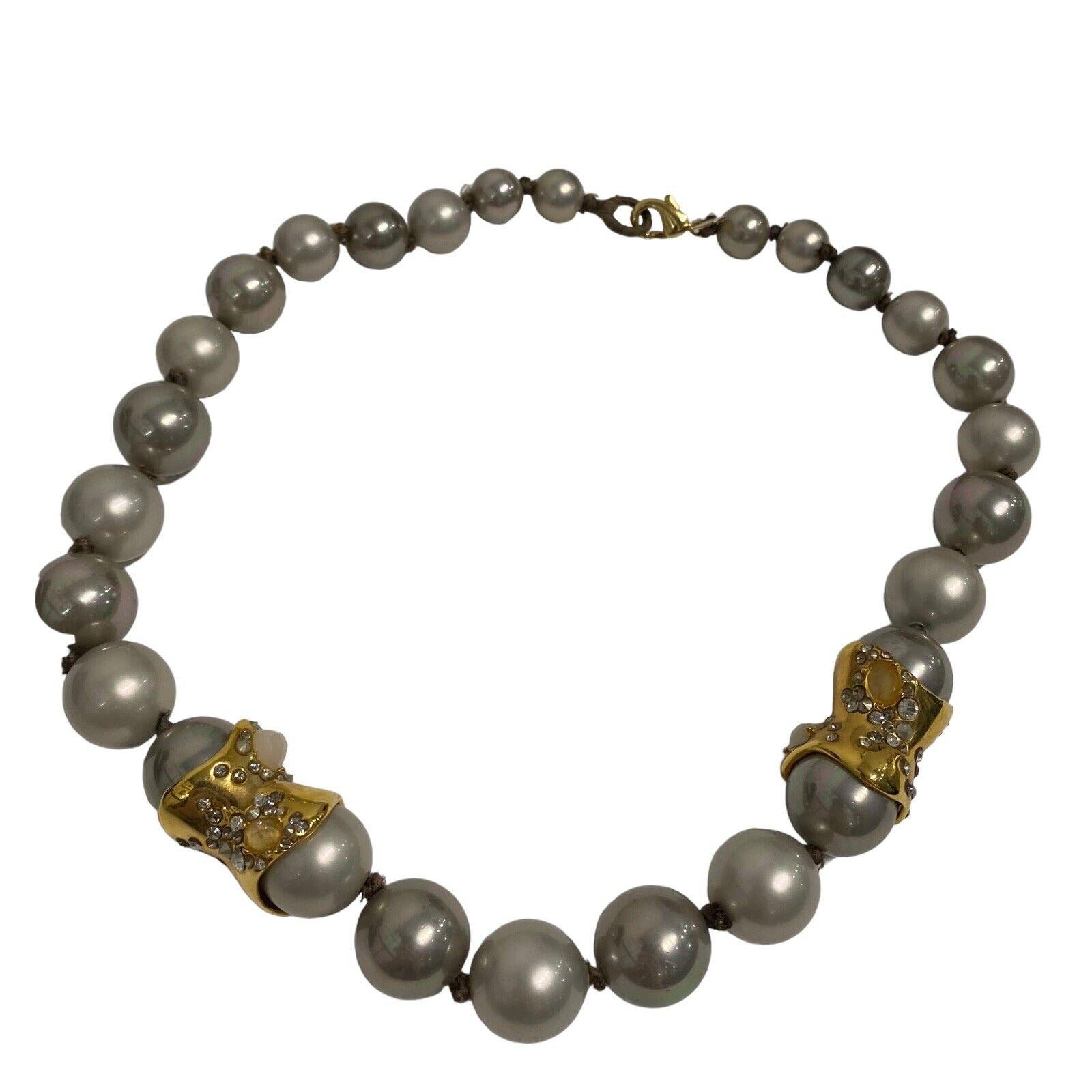 Simply Beautiful! Vintage ALEXIS BITTAR Signed Designer Faux Gray Pearl and Crystal Gilt Choker Necklace. Two Large Gold-Plated Beads with Crystals and Lucite details add a Stylish accent. Hand strung with knots. The necklace measures approx. 16”