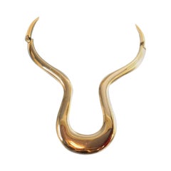 Collar gargantilla vintage Alexis Kirk articulado en tono dorado Circa años 80