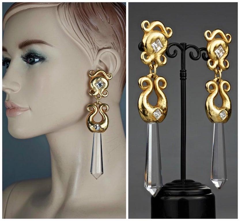 Vintage ALEXS LAHELLEC PARIS Prism Dangling Earrings

Measurements:
Height: 5.31 inches (13.5 cm)
Width: 1.10 inches (2.8 cm)
Weight per Earring: 24 grams

Features:
- 100% Authentic ALEXS LAHELLEC PARIS.
- Long elaborate earrings with dangling