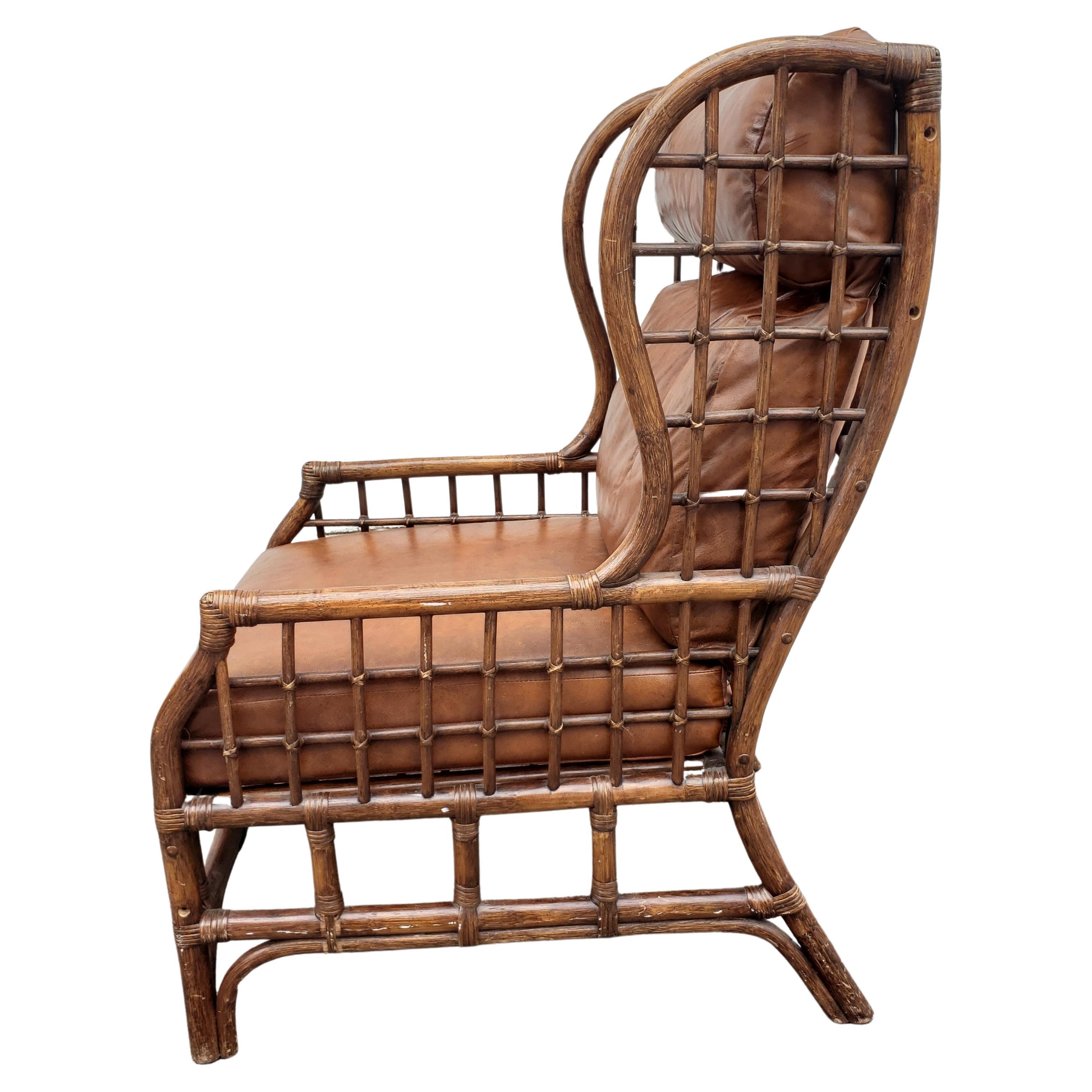 Vintage Alexvale Webbed  Rattan and Wicker Armchair with Leather Cushions In Good Condition In Germantown, MD