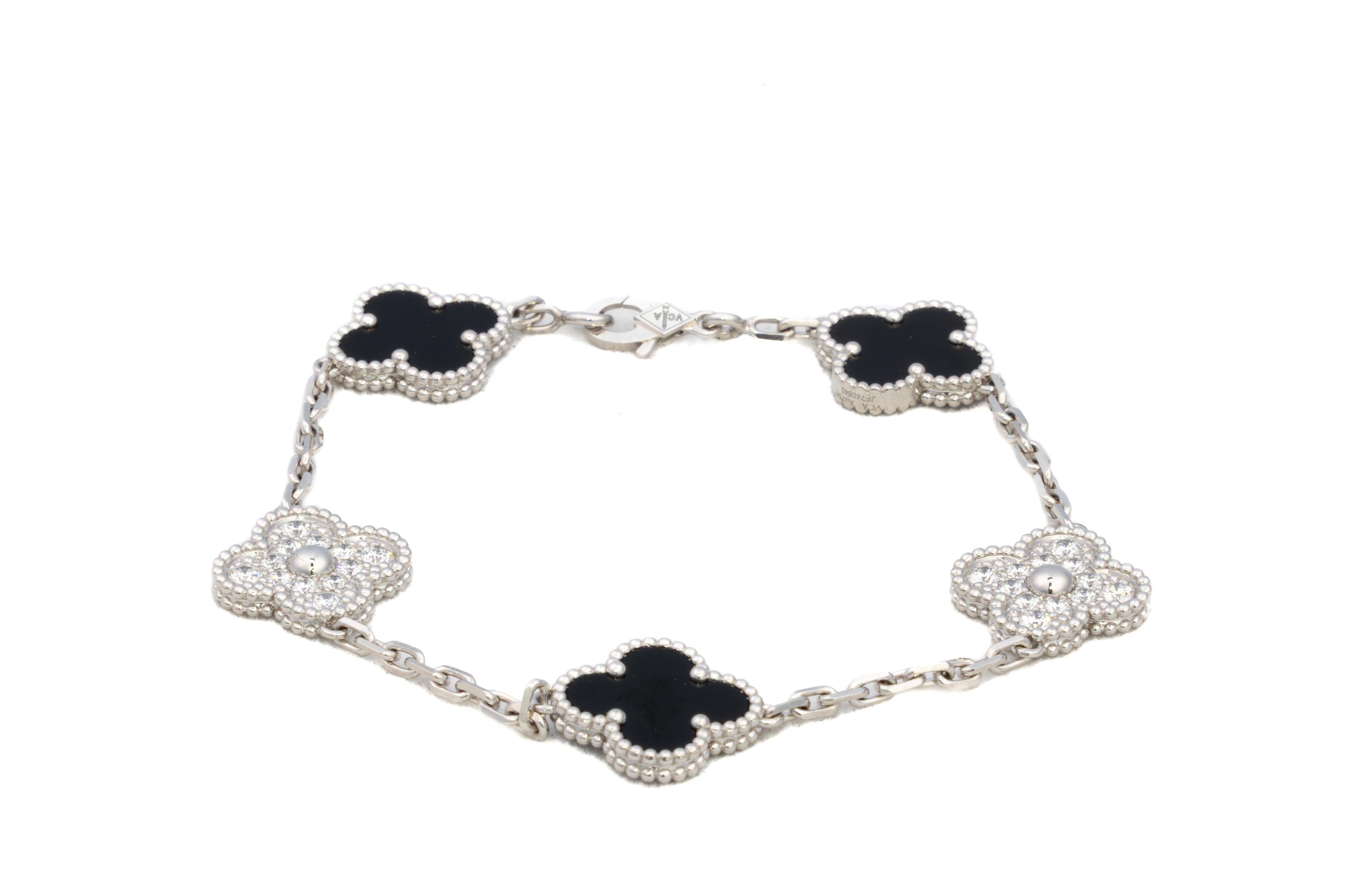 Vintage Alhambra Diamond & Onyx 5 Motif Bracelet

A beautiful five-motif bracelet from Van Cleef & Arpels’ Vintage Alhambra collection, featuring alternating black onyx and pavé diamond clovers set in 18k white gold. The combination of bold onyx and