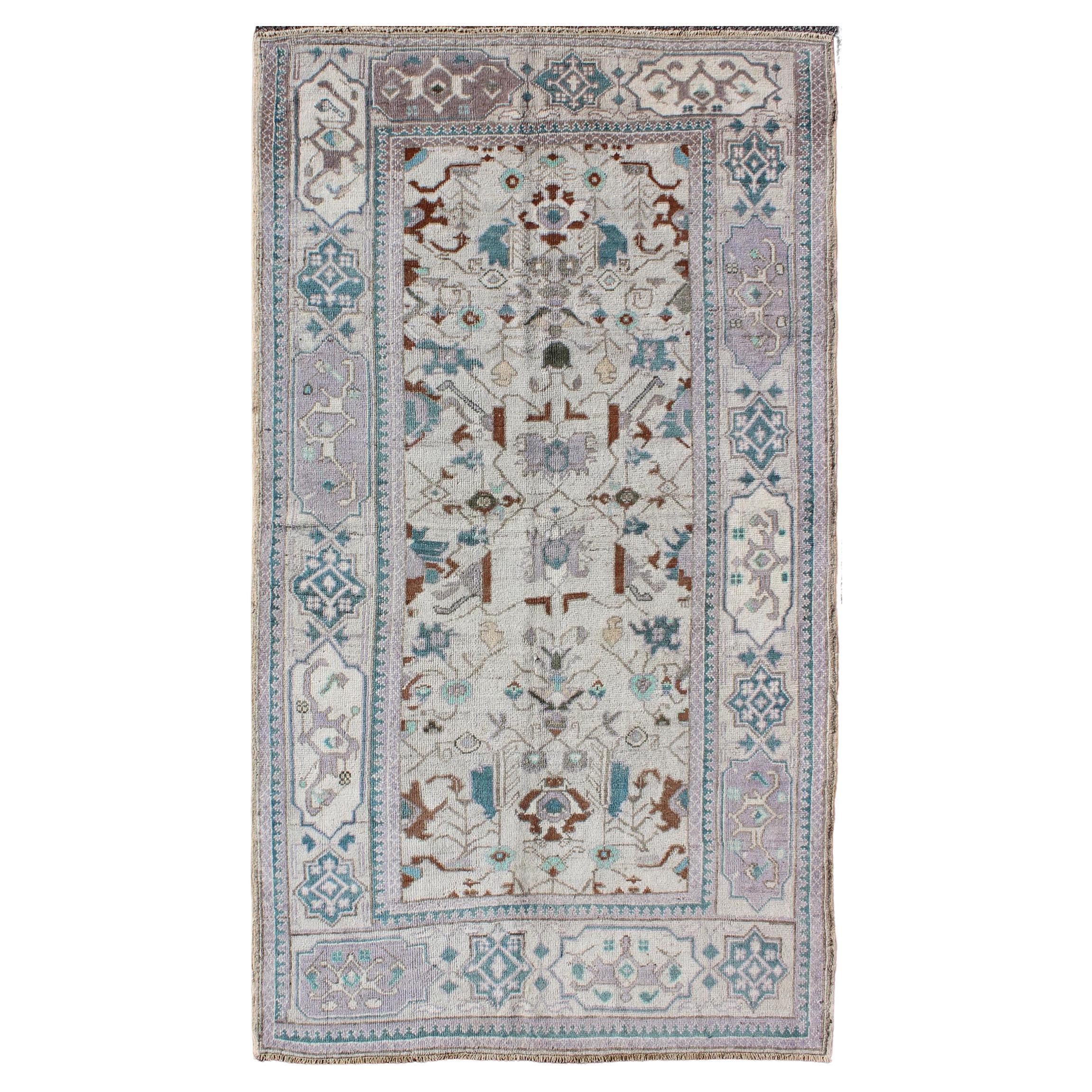 Vintage All-Over Floral Turkish Oushak Area Rug in Cream, Blue, Lilac and Brown For Sale