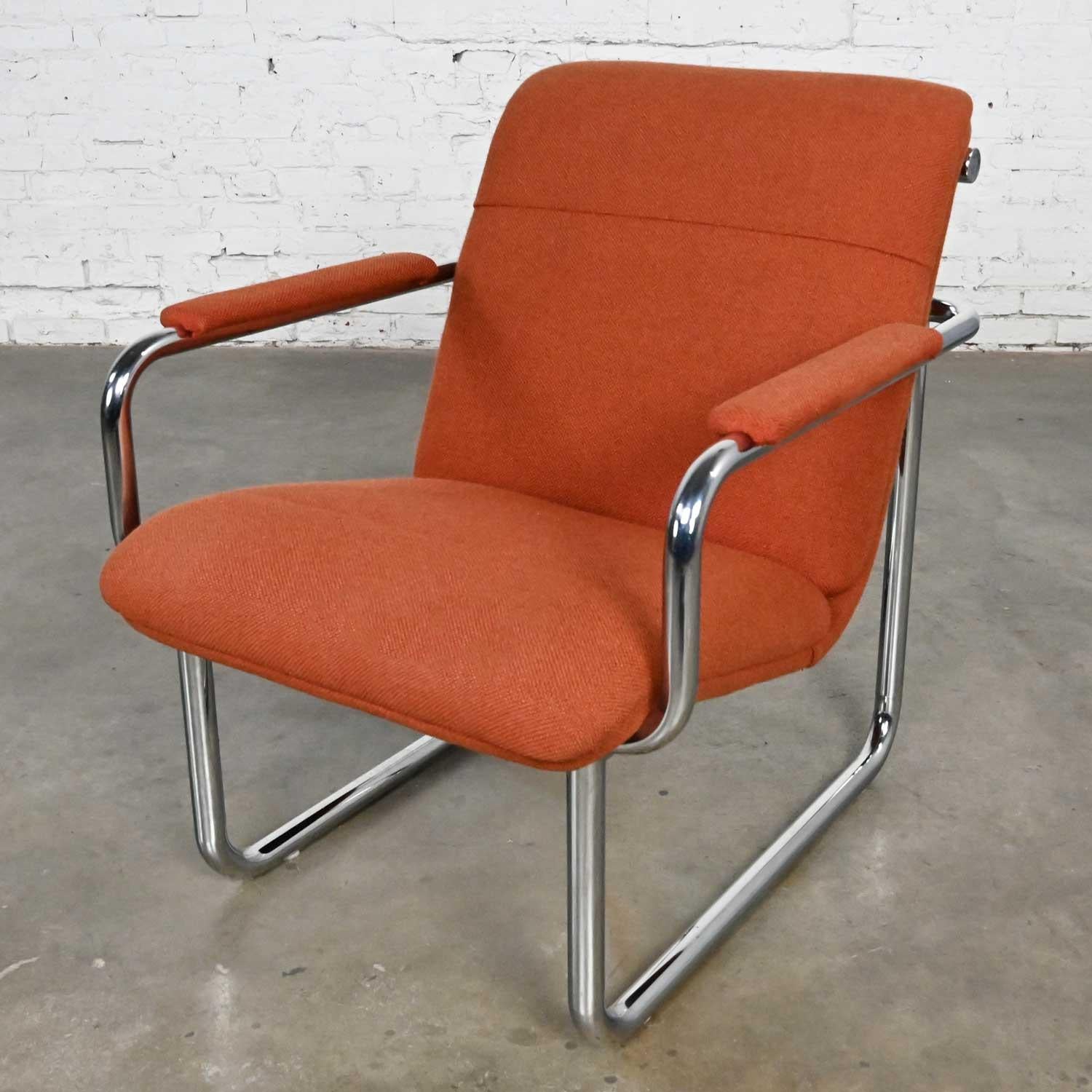 Handsome vintage All Steel Inc. modern armchair comprised of a chrome frame & original orange hopsacking fabric. Beautiful condition, keeping in mind that this is vintage and not new so will have signs of use and wear. It has been professionally
