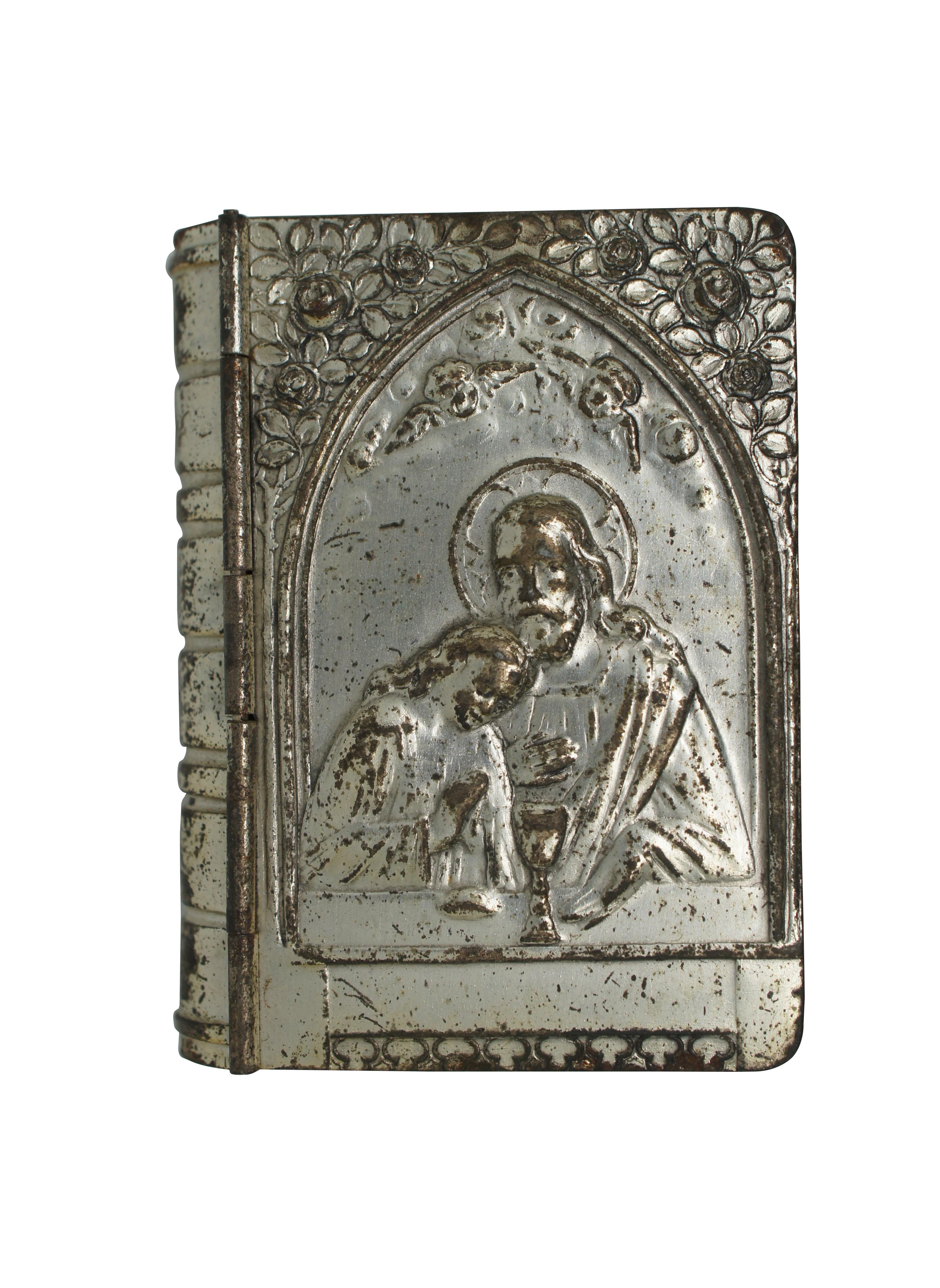 Mid to early 20th century German / French silver plate rosary holder case and necklace.  Shaped like a bible book featuring a scene with Jesus giving communion and mother of pearl rosary with cross.  Allemagne is the French name for