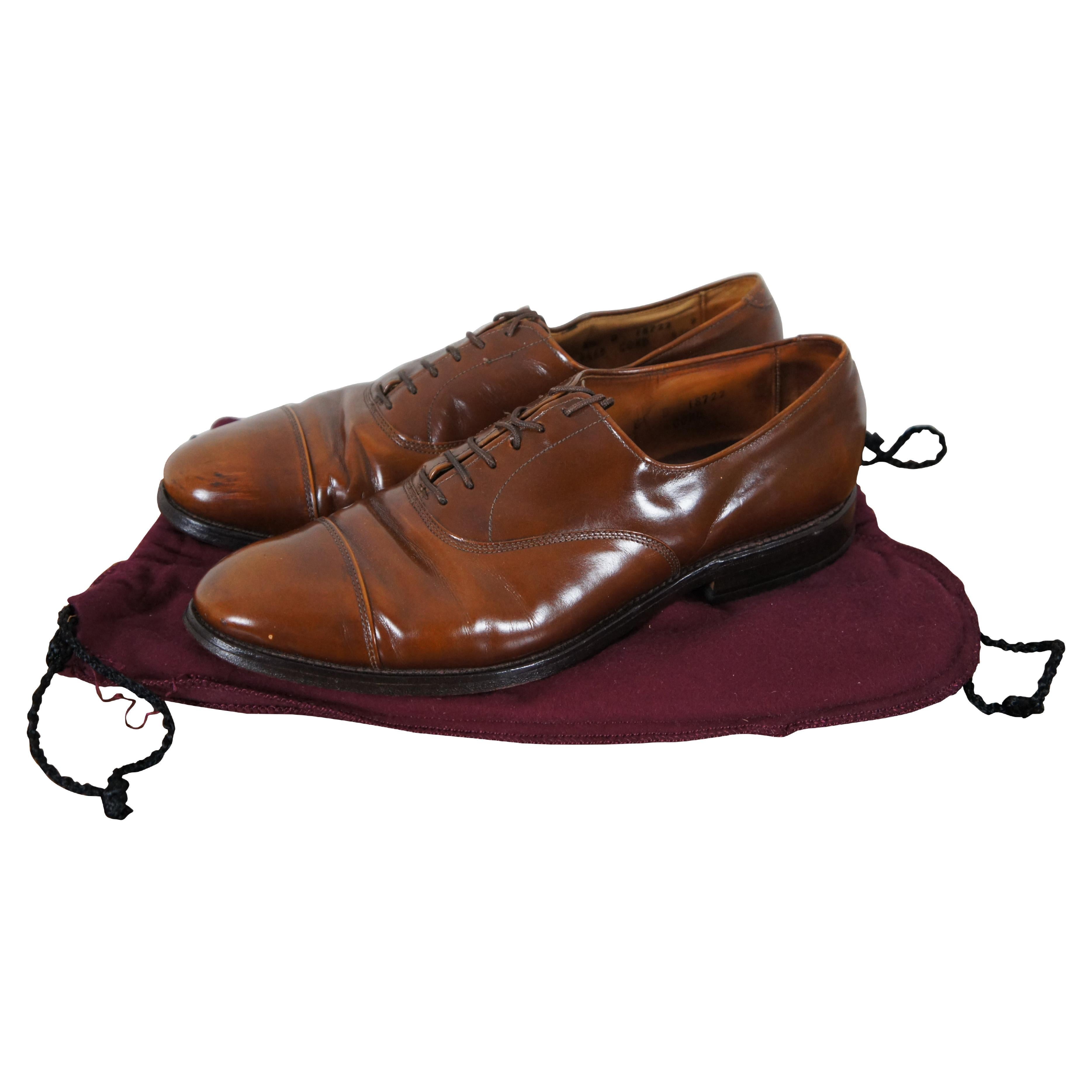 Allen Edmonds “Park Avenue” cap toe leather oxfords in walnut brown. Includes dust bags.

Dimensions

Size 8.5.