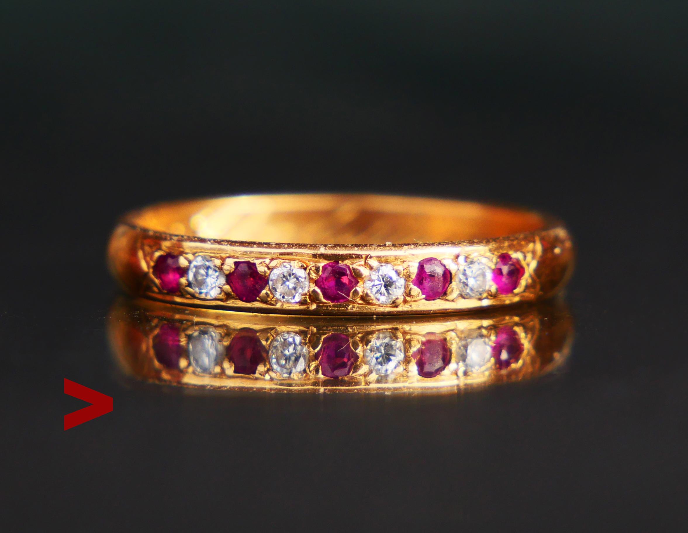 Alliance Ring in solid 18K Yellow Gold with 9 pave set brilliant cut Diamonds and Rubies Ø 1.75 mm / ca 0.02ct. each. Color of Diamonds ca. F,G / VVS. All stones have open backs. Custom hand- made, one of a kind ring.
Swedish hallmarks, 18K and