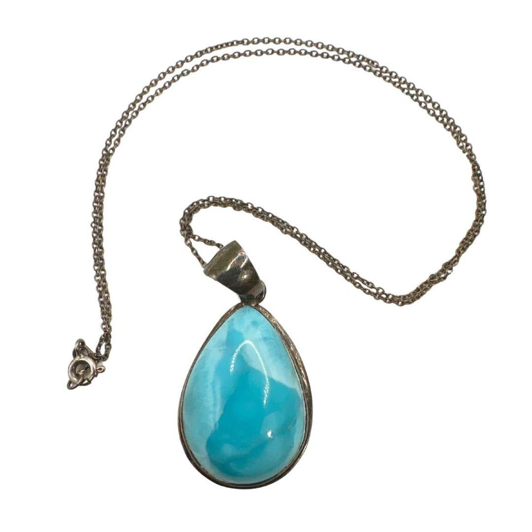 Necklace Length: 18″:

Turquoise Pendant Size: 1.15 X 0.86″

Bin Code: N19 /P13

Experience the enchanting allure of this Vintage Almond Shape Turquoise Necklace, a captivating piece that exudes timeless elegance and natural beauty. Crafted with