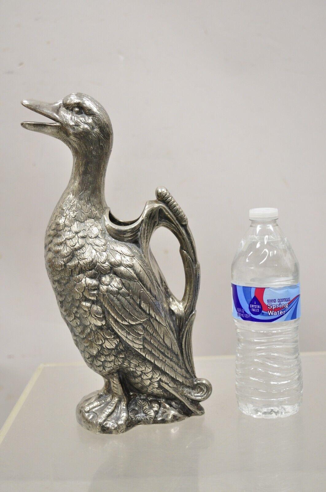 Vintage Alpaca Duck Mallard Figural Silver Plated Water Pitcher Decanter. Item features a nice heavy weight, remarkably detailed, original stamp, very nice vintage item, quality craftsmanship, great style and form. Circa Mid 20th Century.