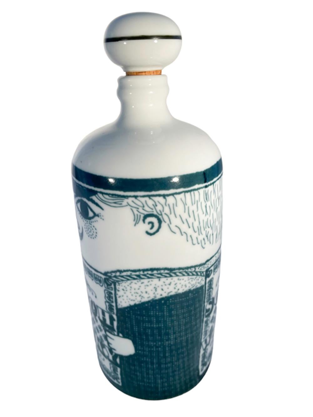 Porcelain decanter or bar bottle of cylindrical form with domed top having a ball-form porcelain and cork stopper. Decorated in underglaze Blue as a 'barman' wearing a sandwich board with the words 