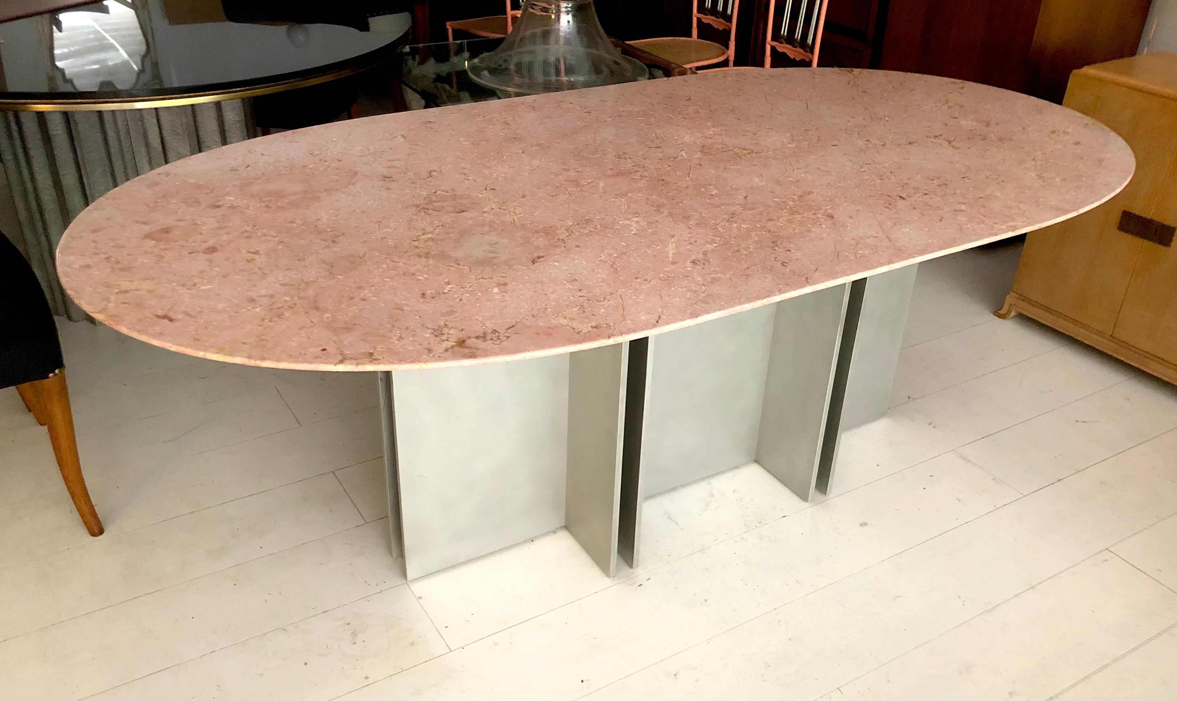 c. 1970s, likely Italian, the architectural, heavy gauge aluminum base supports a thick oval marble top carved with razor edge bevel. Would make an impressive desk. Designer unknown but incredible build quality and design