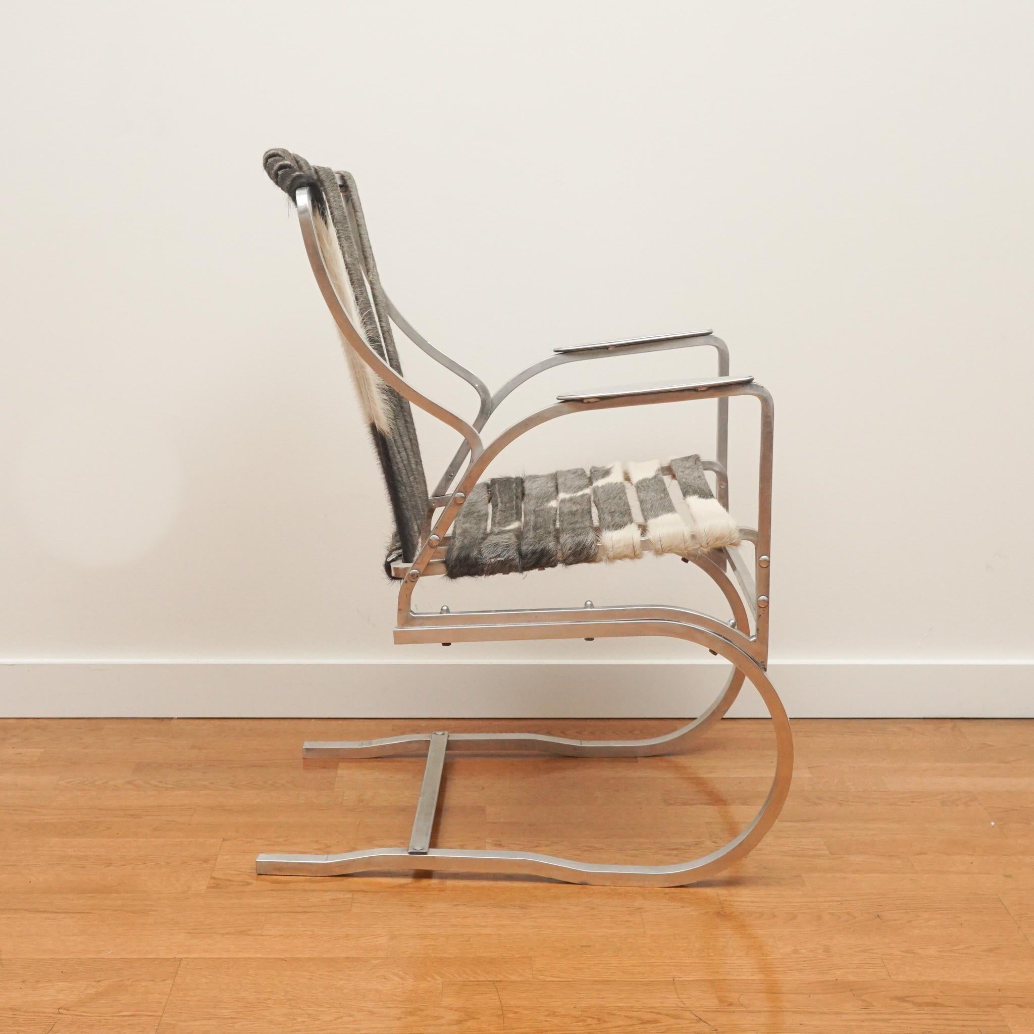Mid-Century Modern Vintage Aluminum Armchair with Cowhide Straps For Sale