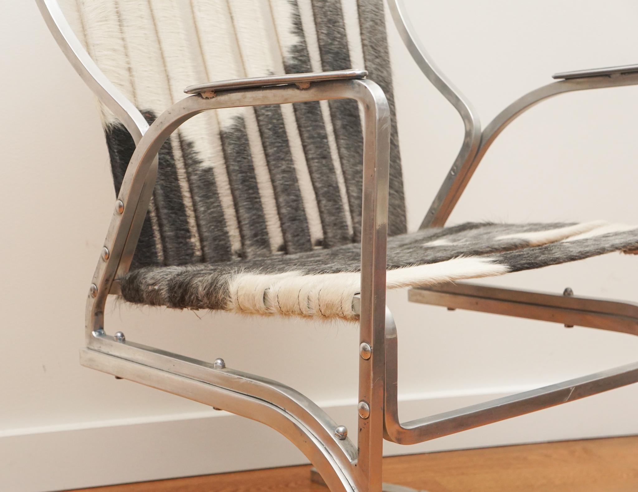 Vintage Aluminum Armchair with Cowhide Straps For Sale 1