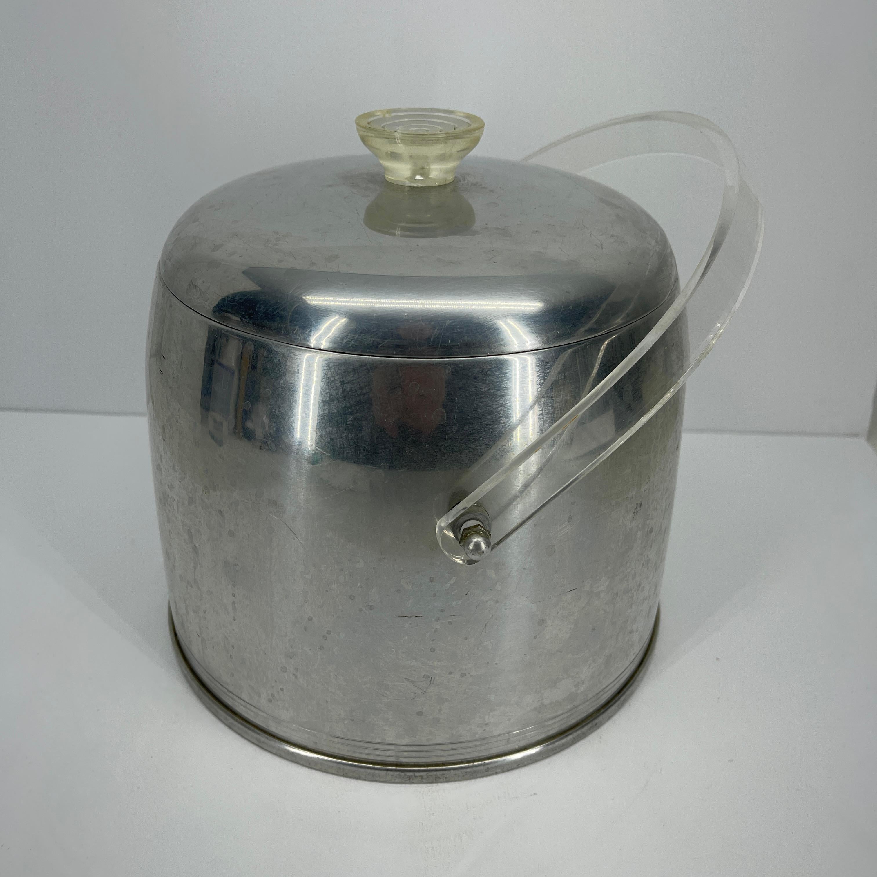 1950's aluminum ice bucket with lucite handle and finial.