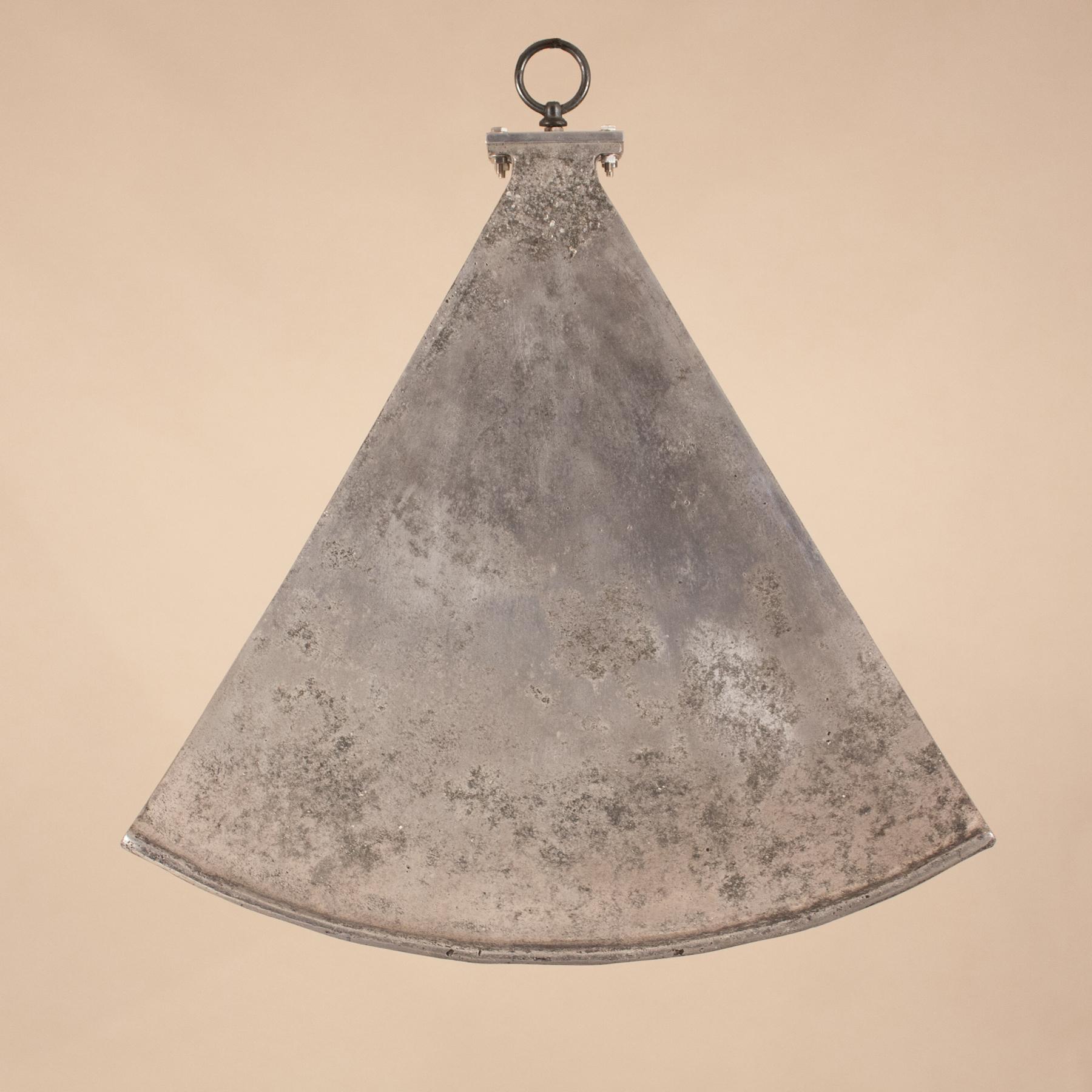 A circa 1950 Bombay movie theater horn loudspeaker finds new life as an industrial style pendant. This aluminum light has very appealing form and an authentic distressed patina. Manufactured by Ahuja Radio of India, the speaker is also available