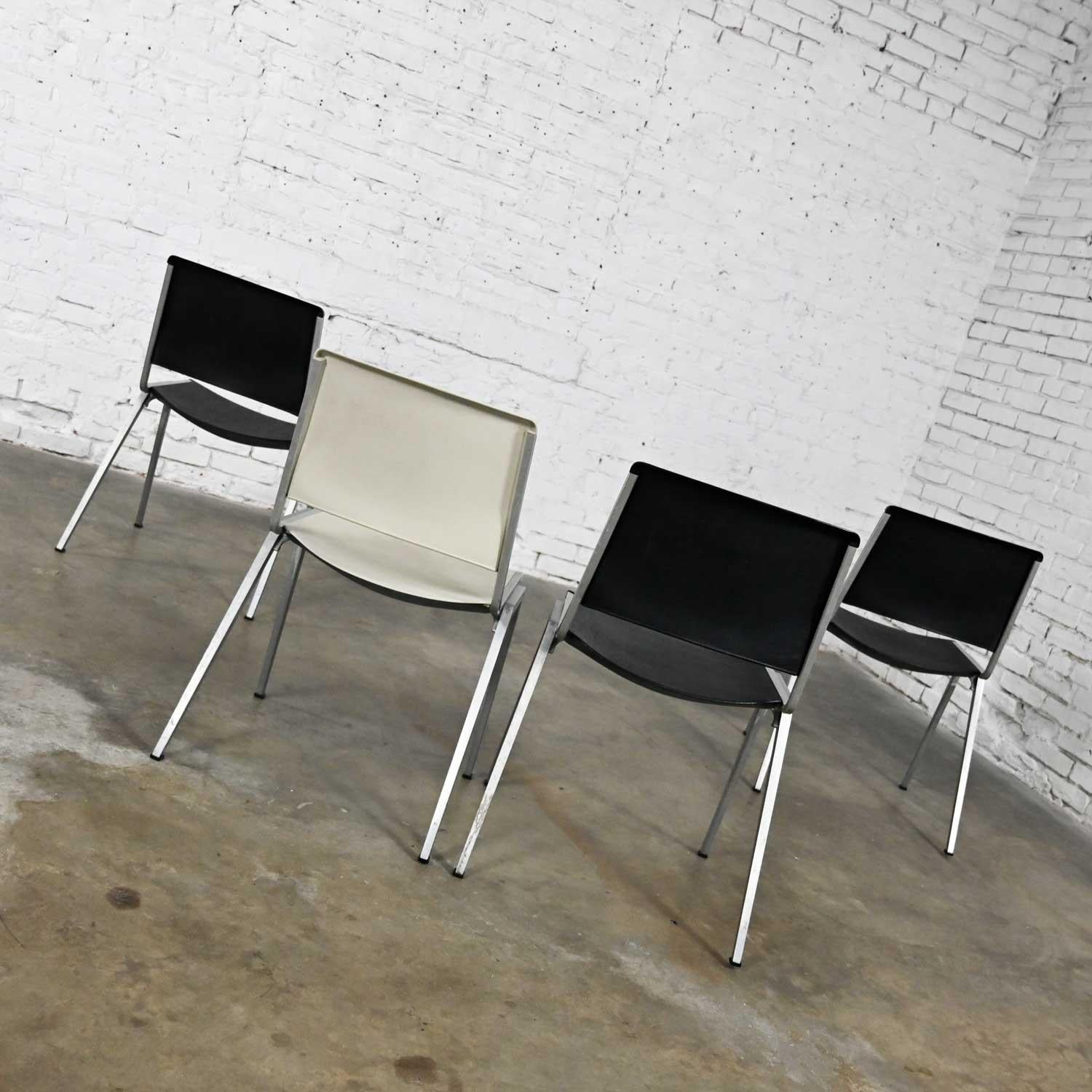 Mid-Century Modern Vintage Aluminum Steelcase Stacking Chairs Model #1278 1 White 3 Black Set of 4 For Sale