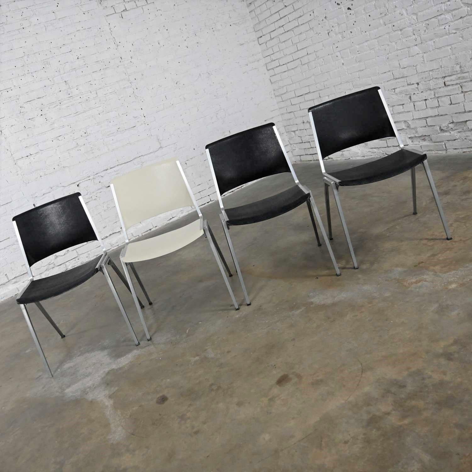 20th Century Vintage Aluminum Steelcase Stacking Chairs Model #1278 1 White 3 Black Set of 4 For Sale
