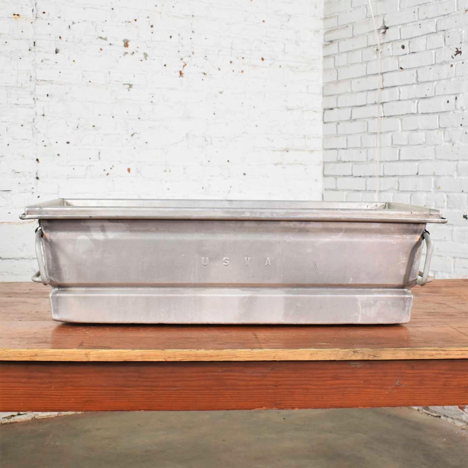 Cool vintage aluminum troughs, planters, sinks, containers, or vessels with bail handles. They are all in wonderful vintage condition with lots of nice patina. These do not look new nor are they meant to look new. They have awesome dings dents and