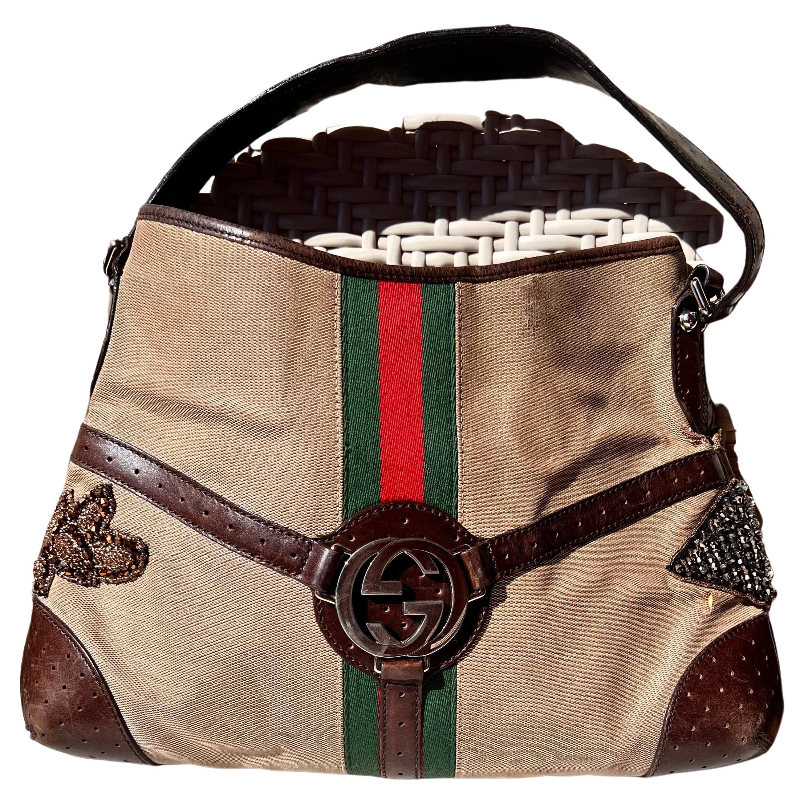 Vintage Amalfi Gucci GG Logo Canvas and Leather bag
with customized embroidery to make it unique and more sophisticated for age
Material Brown Leather &  Beige Canvas 
Color Brown and Gucci green and red 
Length   39 cm  15,35 inches
Height    26 cm