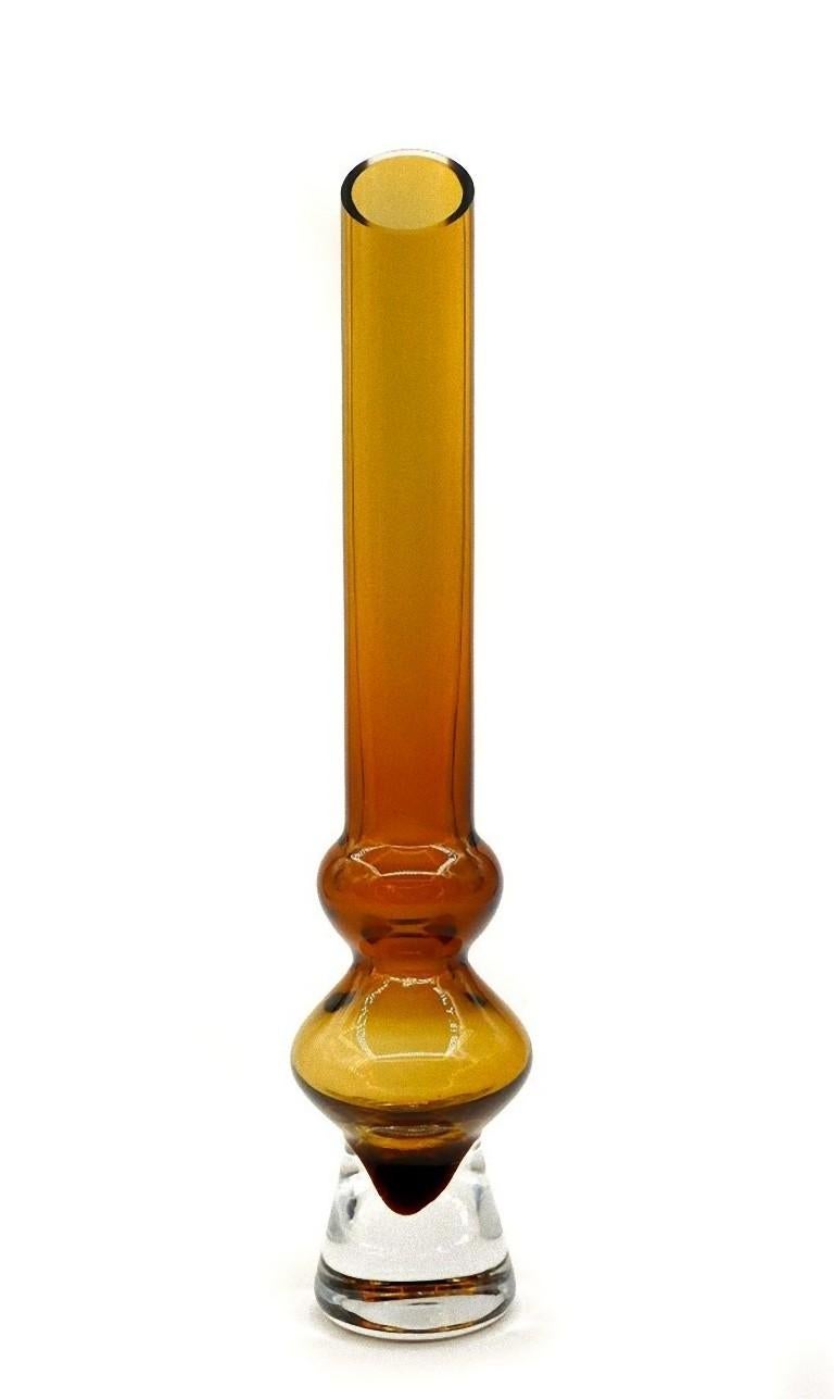 Vintage amber glass is an original decorative object made in Sweden, realized by Bo Borgström for Aseda Glasbruk during the 1960s.

In clear amber. Dimensions: cm 40 x 8. 

Excellent conditions.