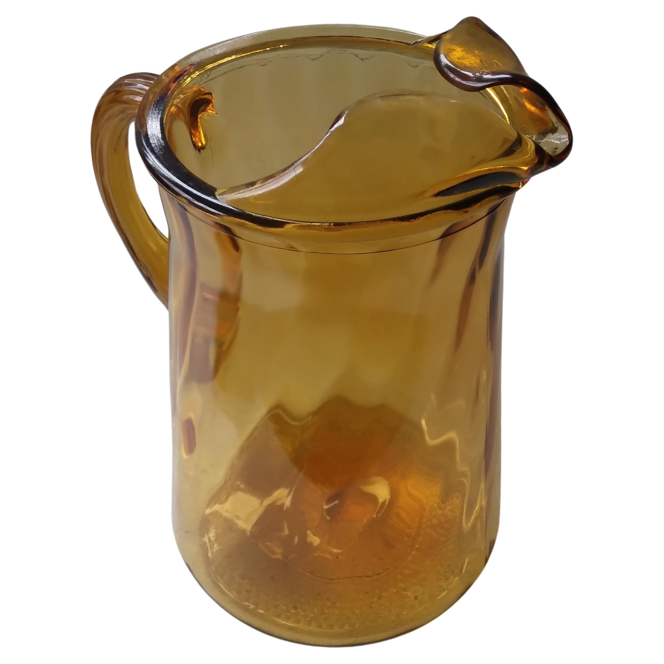 Vintage Amber Glass Pitcher with Swirl Pattern For Sale
