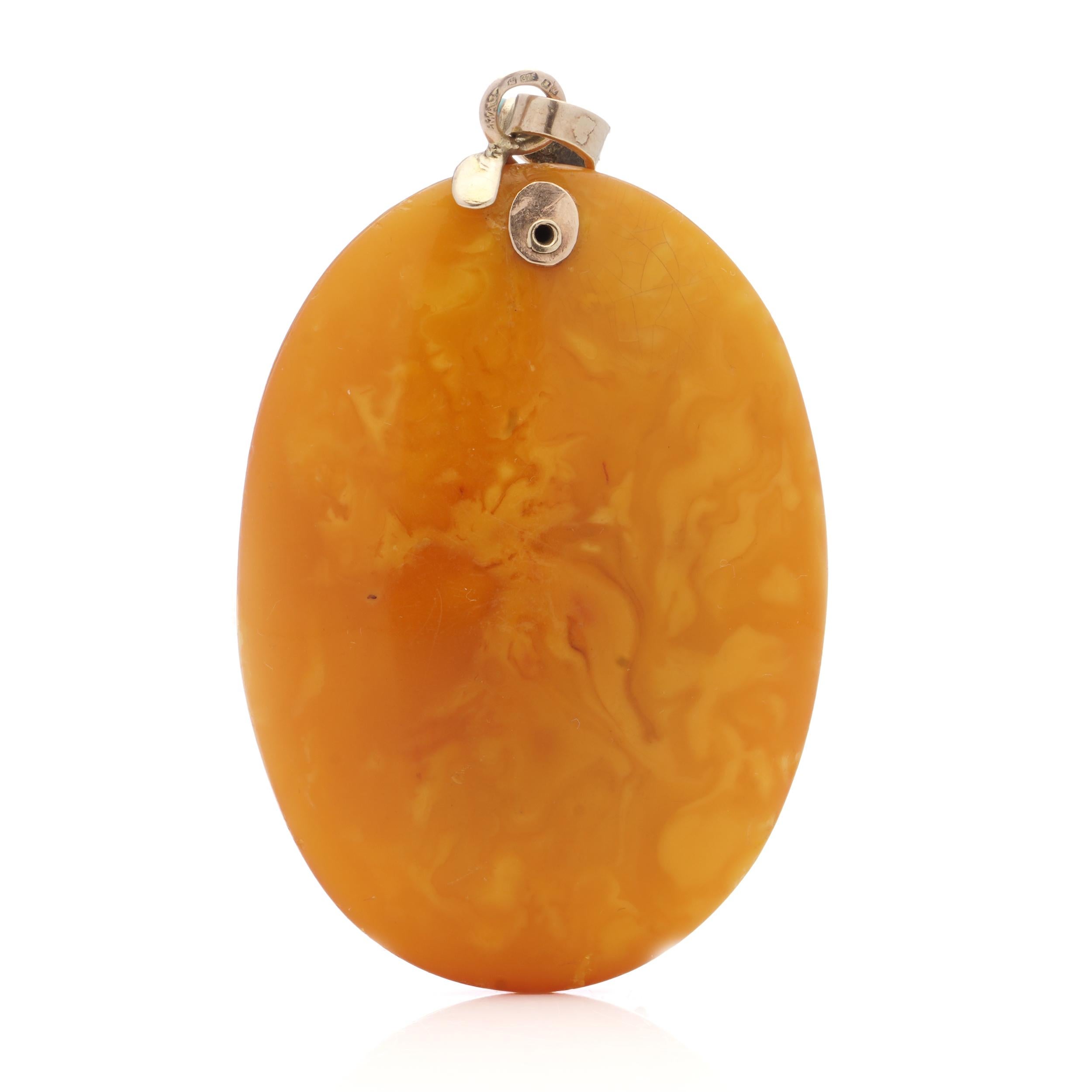 Women's Vintage Amber pendant with 9kt. rose gold mount in the shape of a serpent's head For Sale