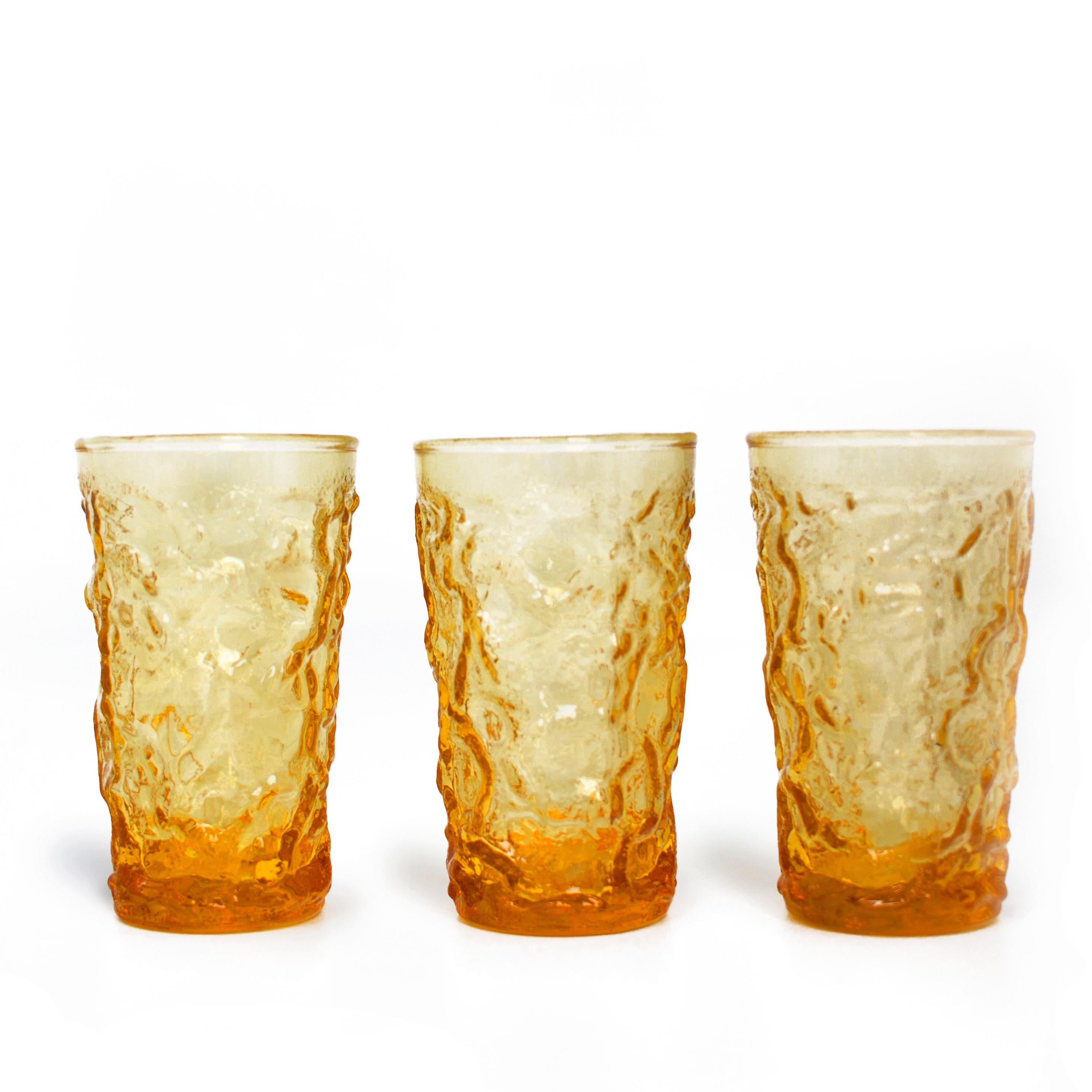 Made in Italy
Measures: 2.25 x 4in
1960s
Glass
Set of 5 mid century tumbler glasses to add color to your kitchen. Textured glass.



