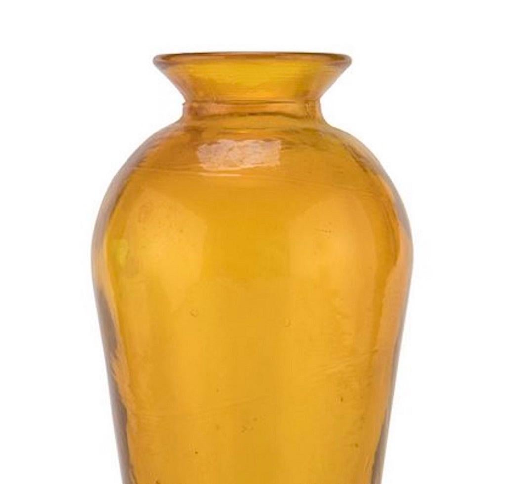 Amber vase is a unique vase realized by Italian manufacture in the 1930s.

A beautiful amber-colored vase, with a cone shape. 

Very good conditions.

This object is shipped from Italy. Under existing legislation, any object in Italy created