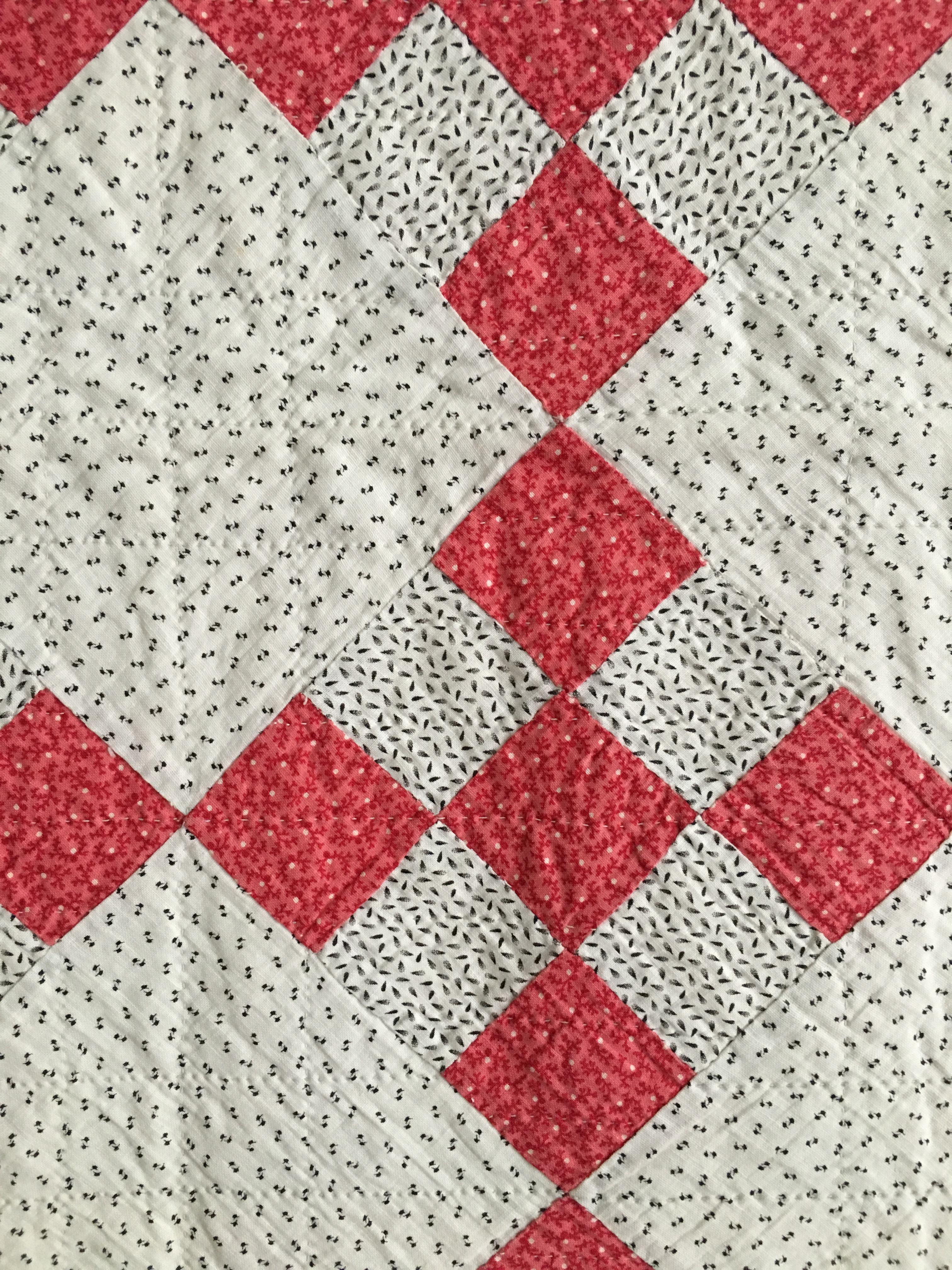 red patchwork quilt