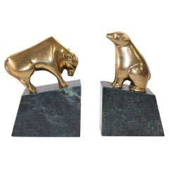 American Art Deco Polished Brass Bull and Bear Bookends Paperweights 1950s