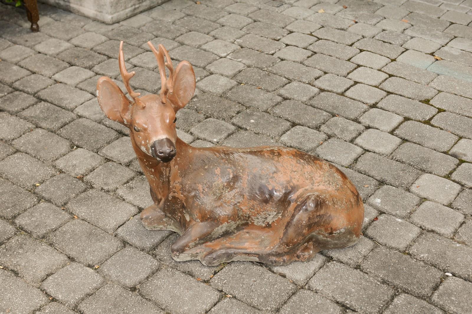 Rustic Vintage American Concrete Reclining Deer Sculpture with Iron Antlers and Patina For Sale