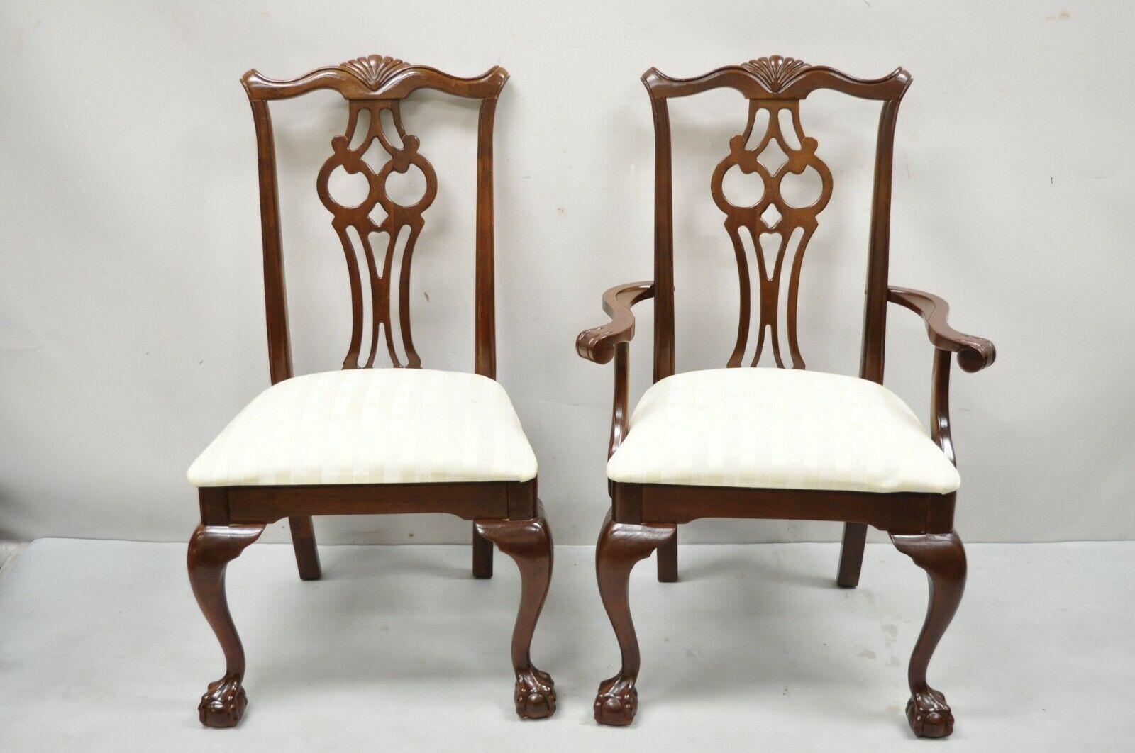Vintage American drew cherry wood Chippendale style dining chairs - set of 6. (4) Side chairs and (2) armchairs. Items features a beautiful wood grain, nicely carved details, original label, carved ball and claw feet, quality American craftsmanship,