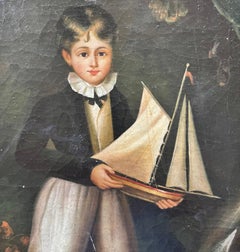 Olio su tela vintage americano incorniciato - Ragazzo con barca giocattolo, firmato Trevor James