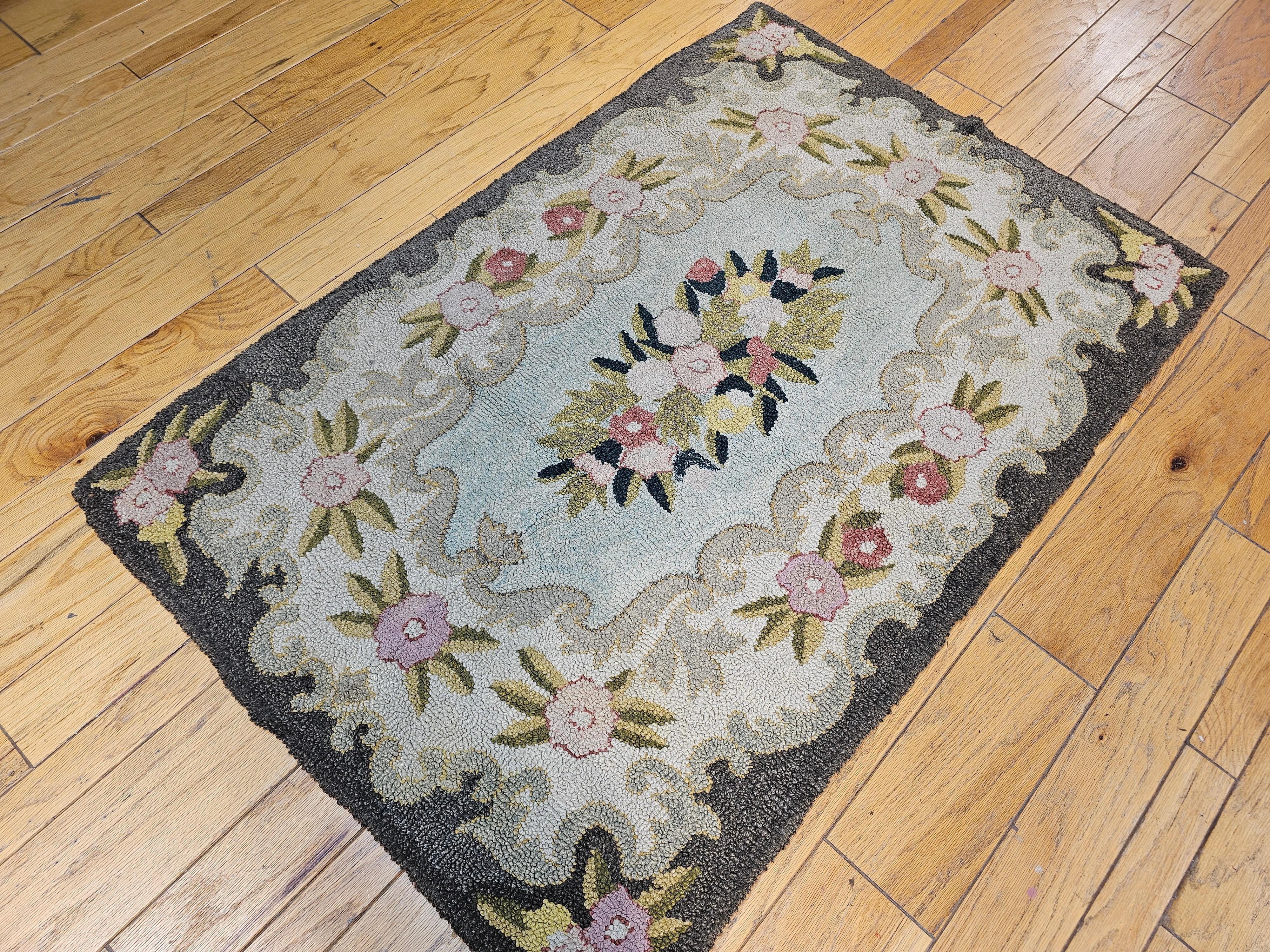 Vintage American Hand Hooked Area Rug with a Floral Pattern in Pastel Colors For Sale 3