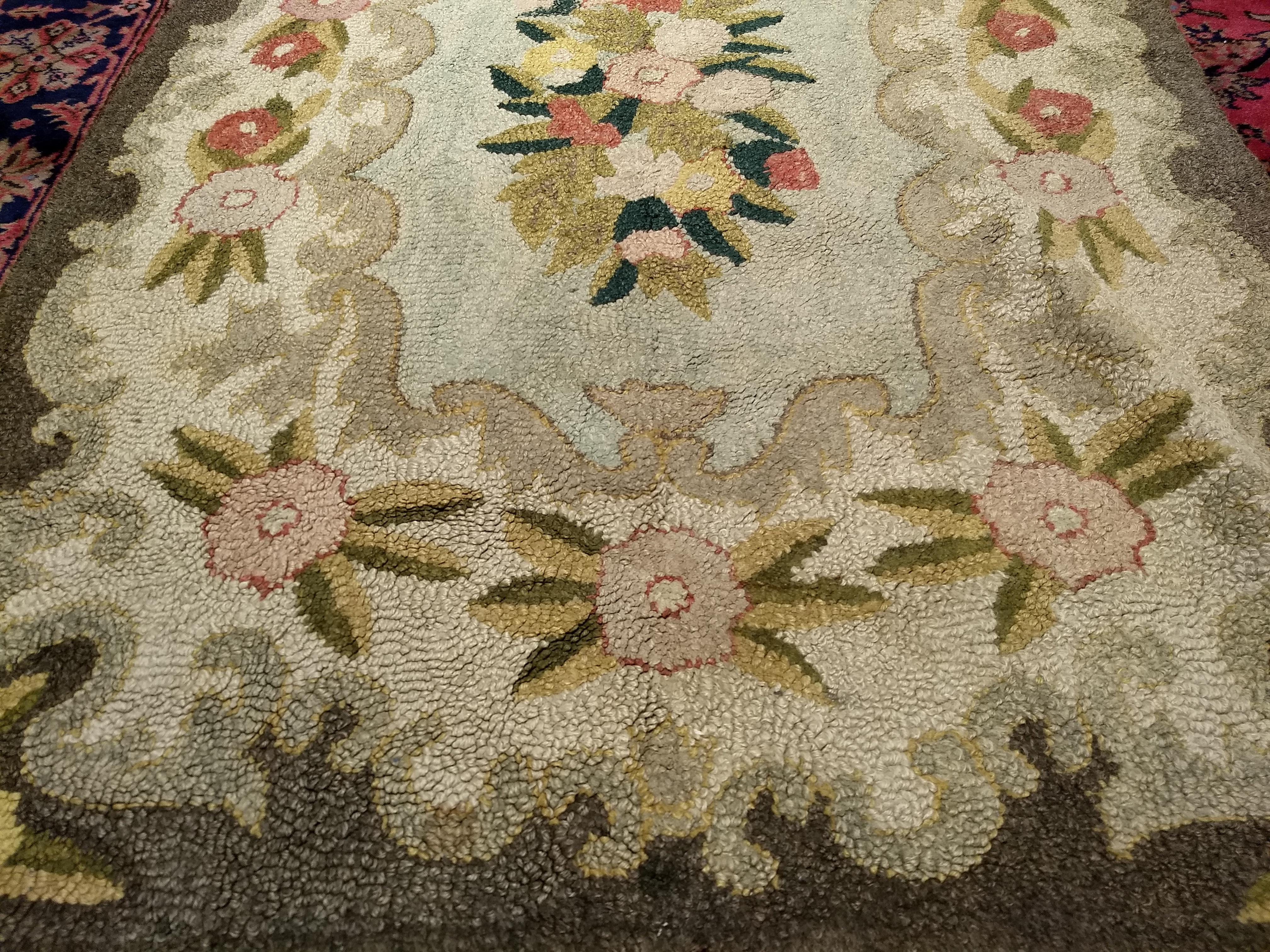 Hand-Crafted Vintage American Hand Hooked Area Rug with a Floral Pattern in Pastel Colors For Sale