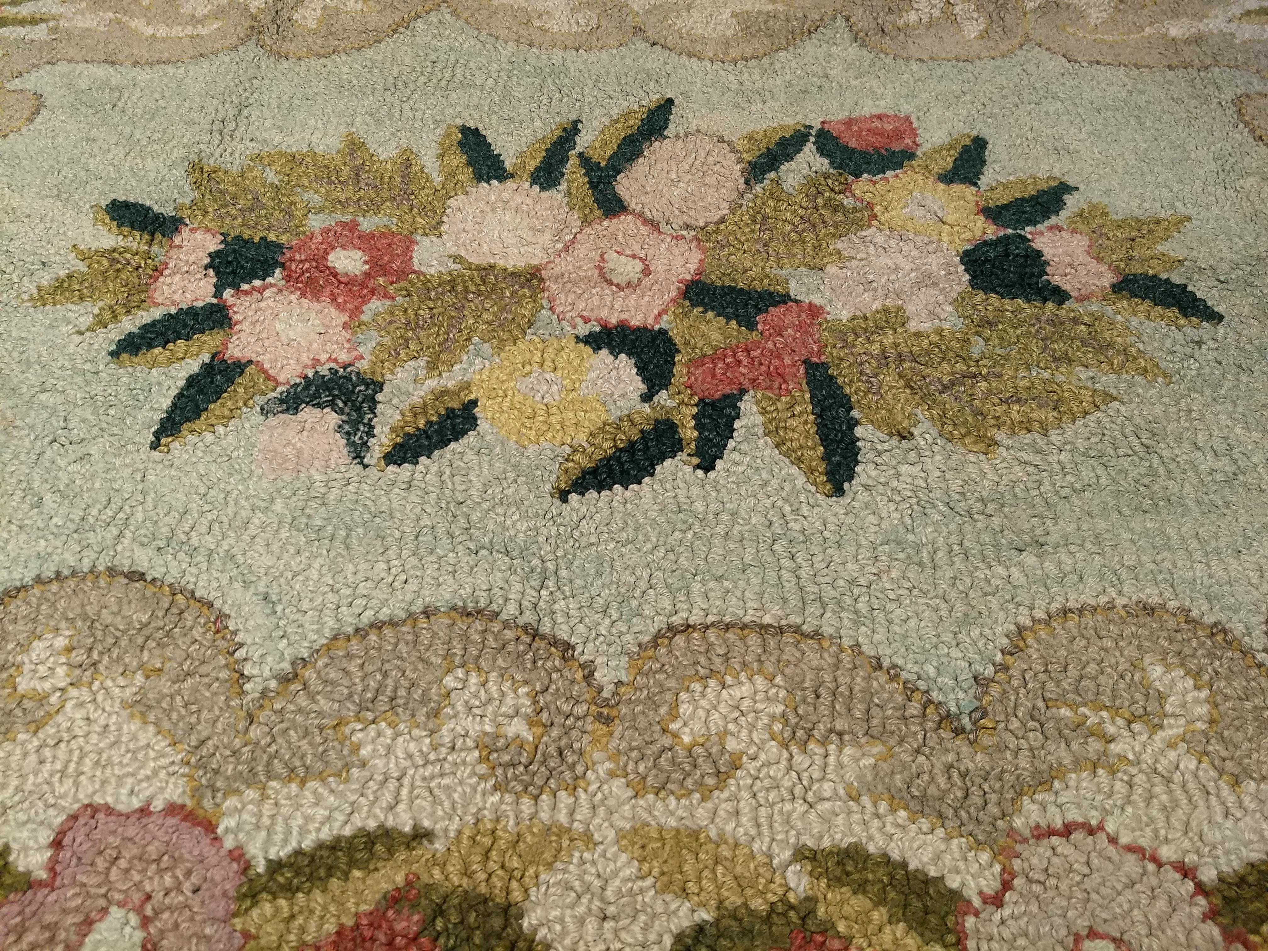 Wool Vintage American Hand Hooked Area Rug with a Floral Pattern in Pastel Colors For Sale