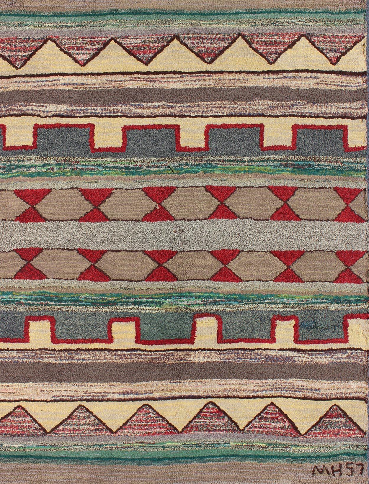 Hand-Woven Vintage American Hooked Rug with Geometric Tribal Designs For Sale