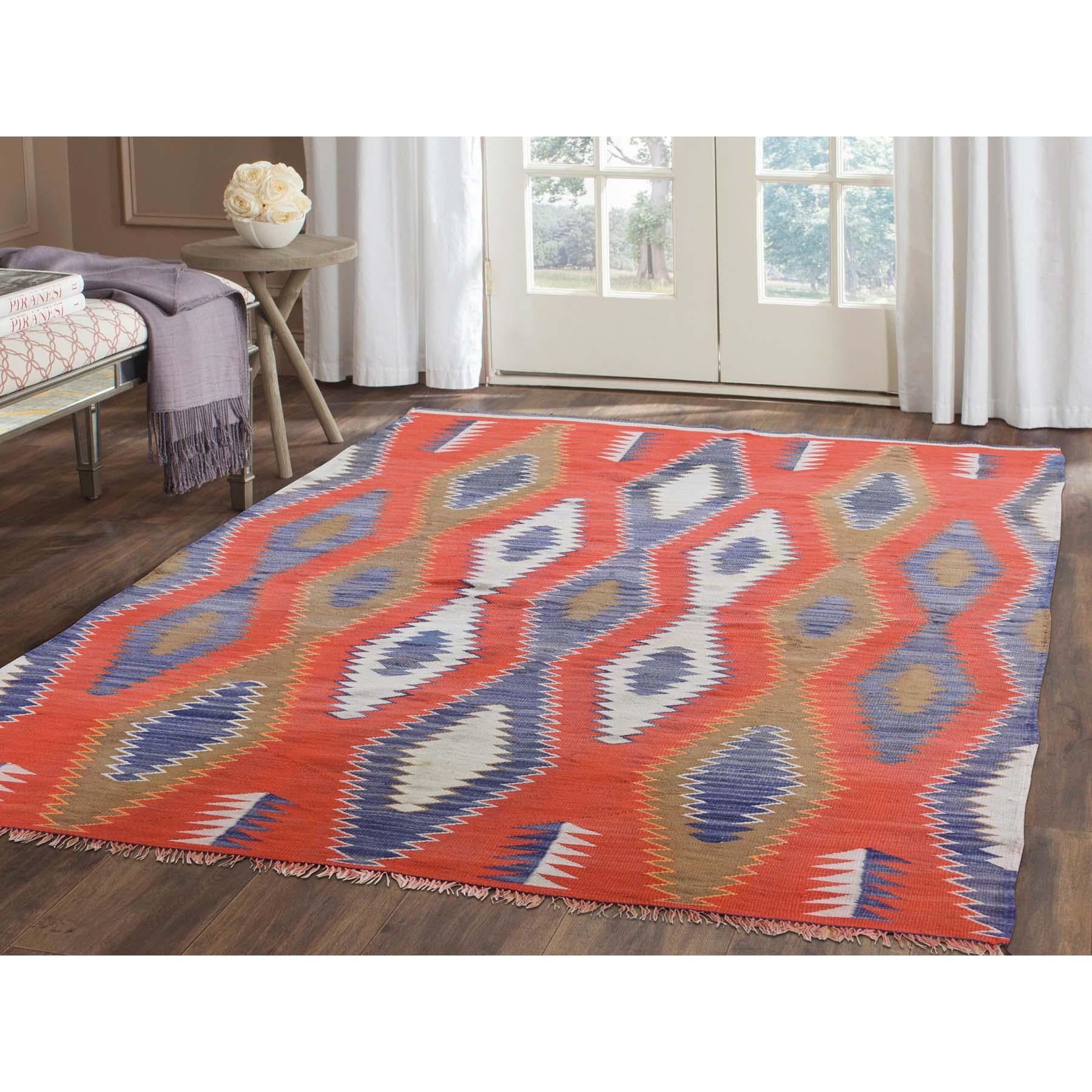 This is a truly genuine one-of-a-kind vintage American Indian Navajo flat-weave handwoven rug. It has been knotted for months and months in the centuries-old Persian weaving craftsmanship techniques by expert artisans.  Measures: 4'9