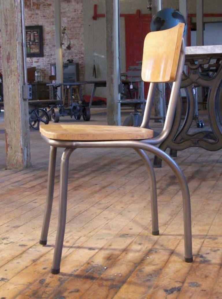 Vintage American Industrial chair with Tubular steel frame and maple seat and back. Restored to original condition.
Overall Dimensions: 16