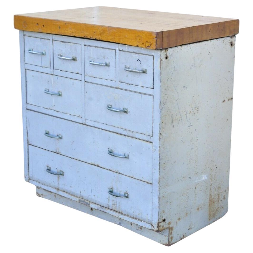 Vintage American Industrial Steel Metal 8 drawer work station table Island tool chest. Item features steel metal frame, wooden butcher block top, distressed finish, 8 drawers. Circa Mid to Late 20th Century. Measurements: 39