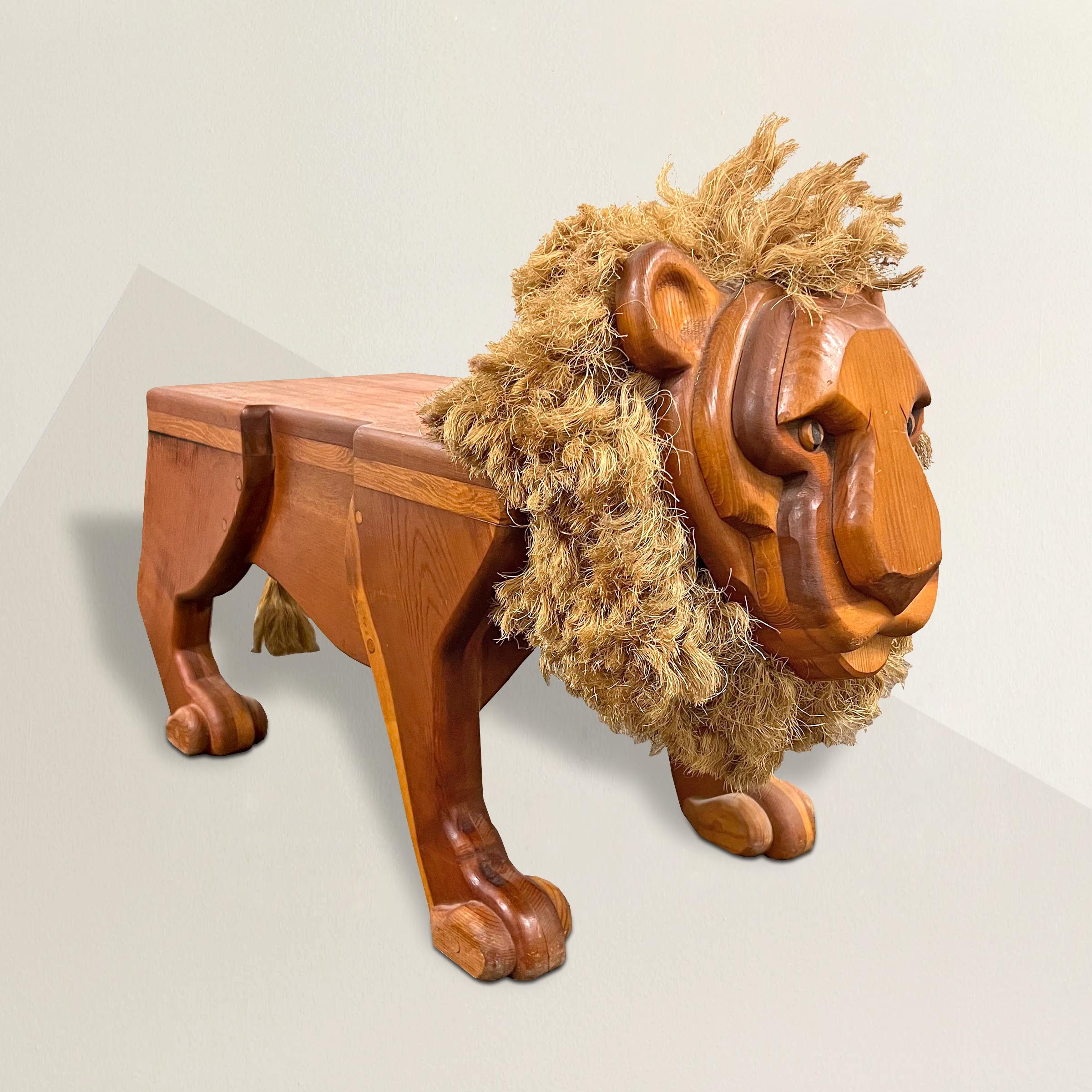 A whimsical and playful mid-20th century American hand-carved pine lion stool with a full mane and rope tail, perfect as a step stool or as a side table or foot stool next to your favorite armchair.