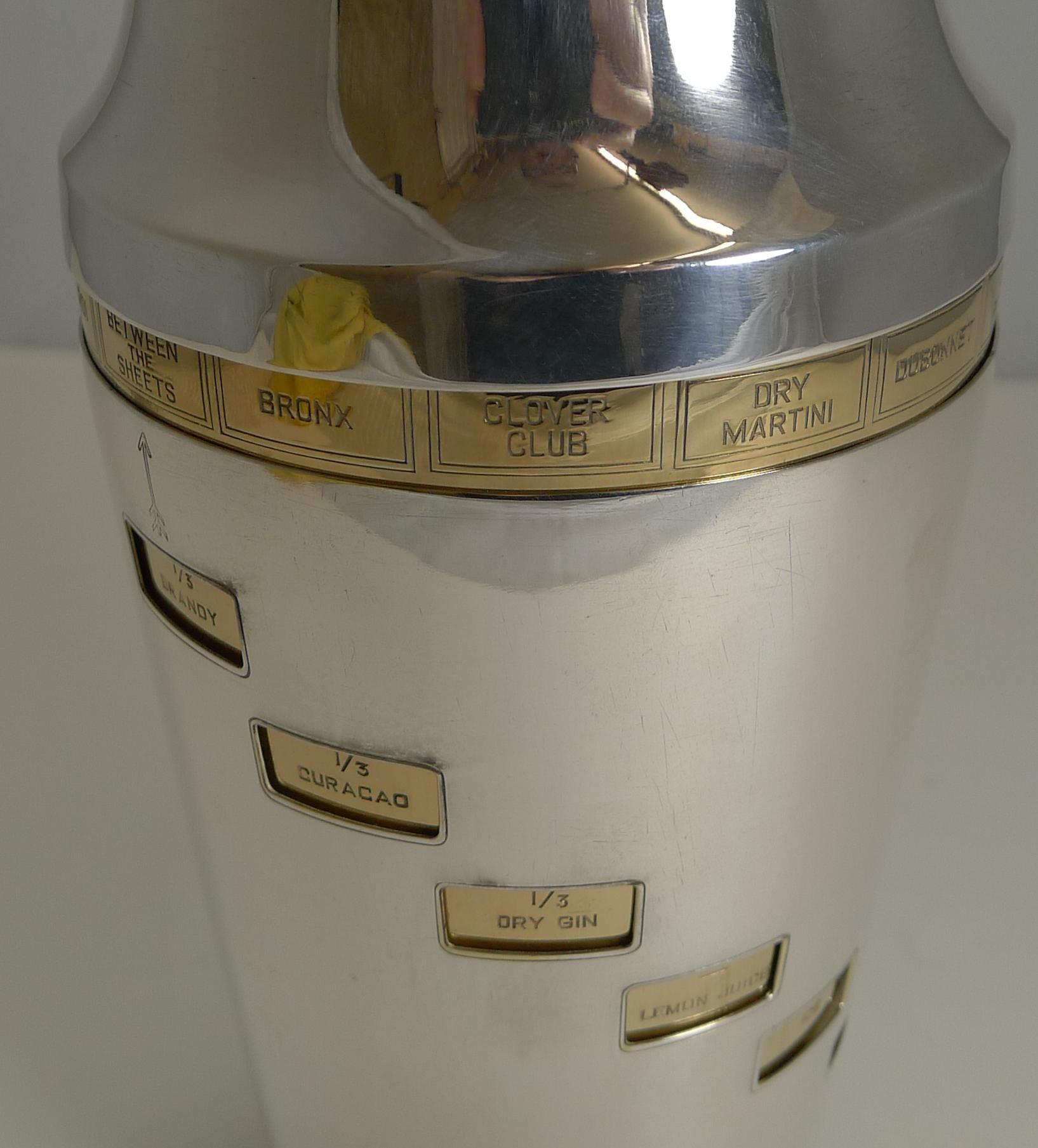 A magnificent original vintage 1930s recipe cocktail shaker just back from our silversmith having had all the gold and silver plating professionally restored and polished to create an outstanding example.

The shaker incorporates a gilded inner