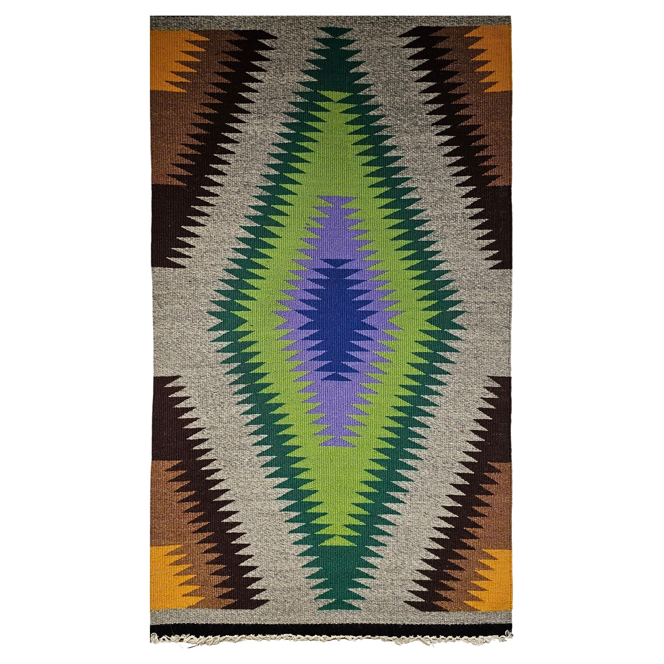 Vintage American Navajo Rug in Eye Dazzler Pattern in Blue, Lavender, Green