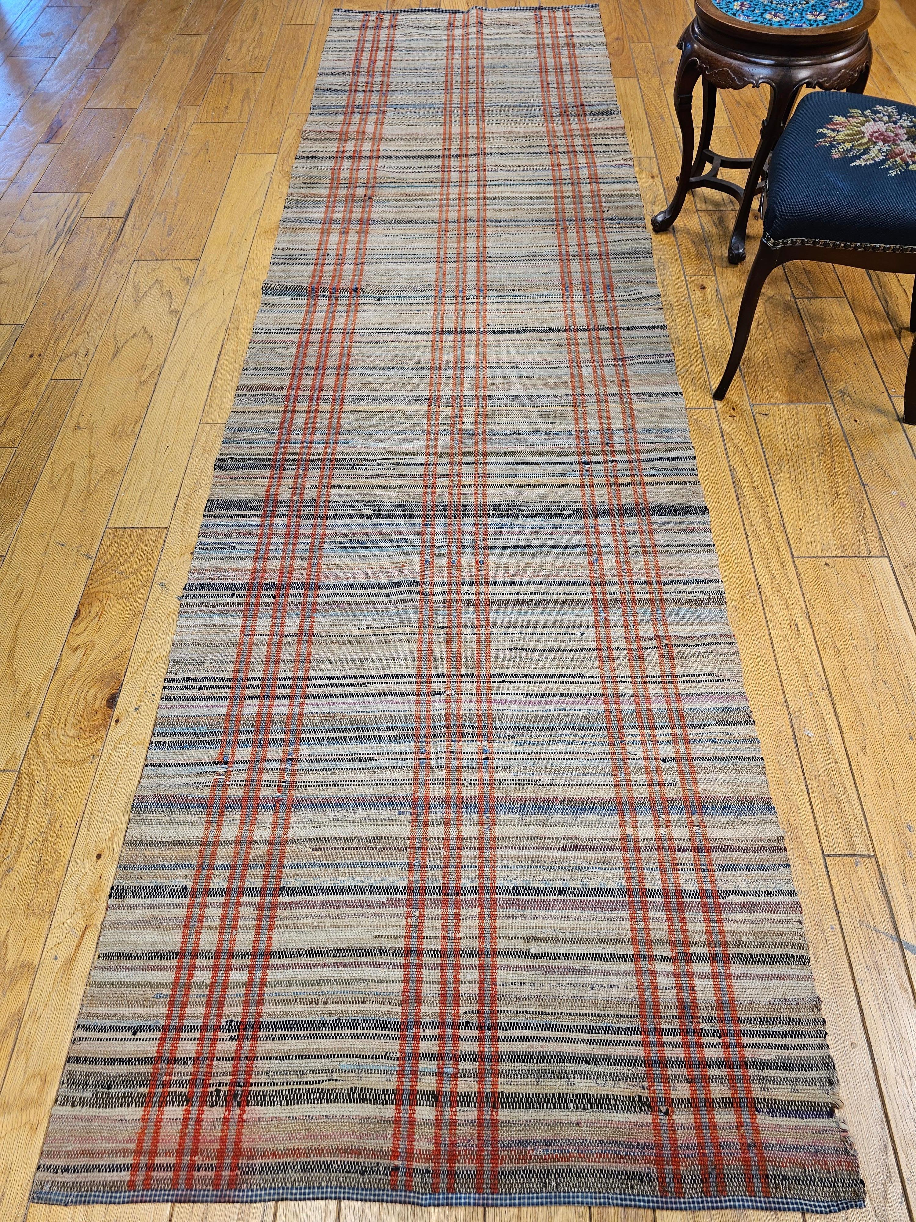 20th Century Vintage American Rag Runner in Tan with Stripe Pattern in Red, Pale Blue For Sale