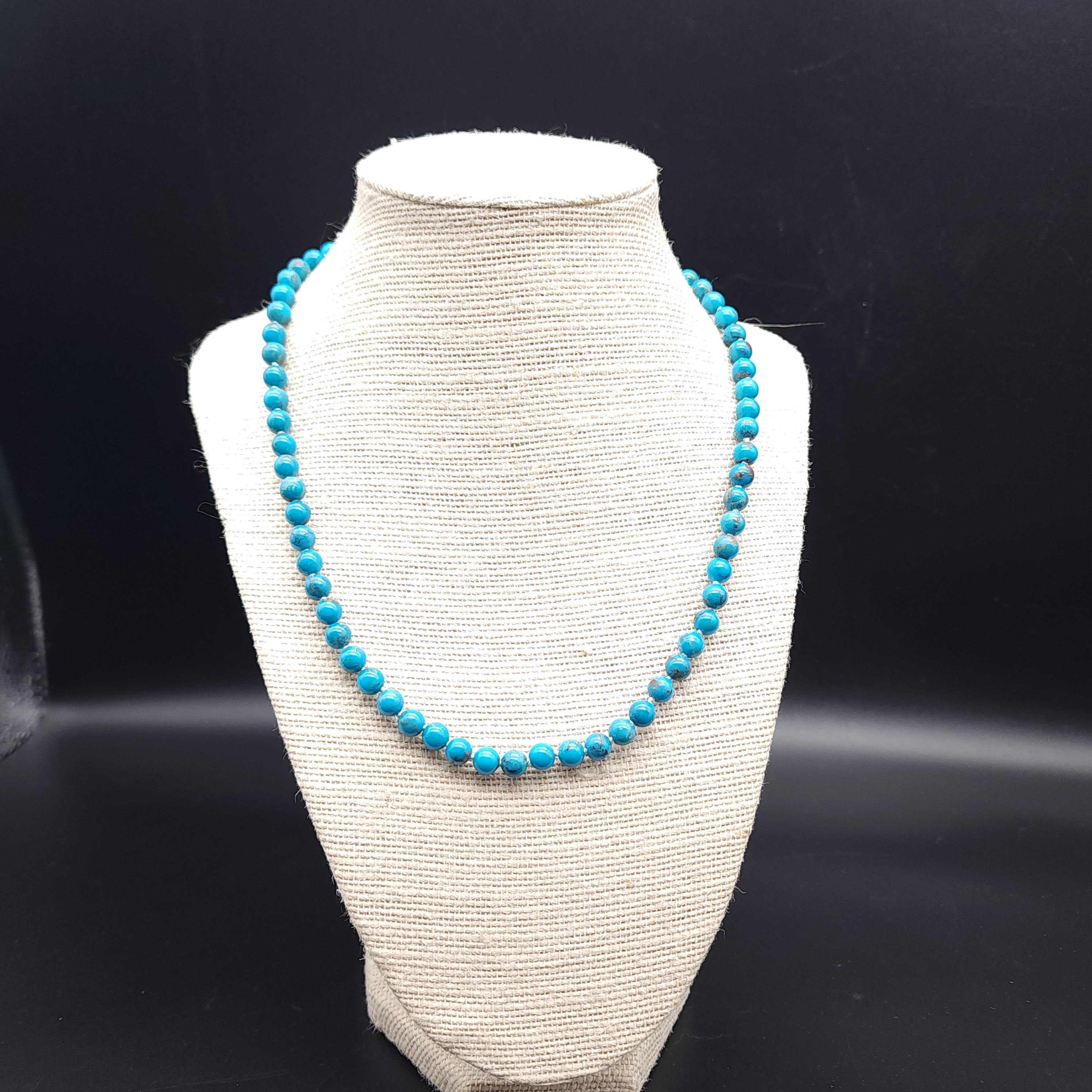 Necklace length: 46.5 cm / 18.4 in
Each bead approximately 1/2 cm
American Turquoise
Marks / Hallmarks: 925 on clasp

Step into a world of timeless beauty with our vintage handcrafted turquoise bead collar necklace, featuring an exquisite sterling