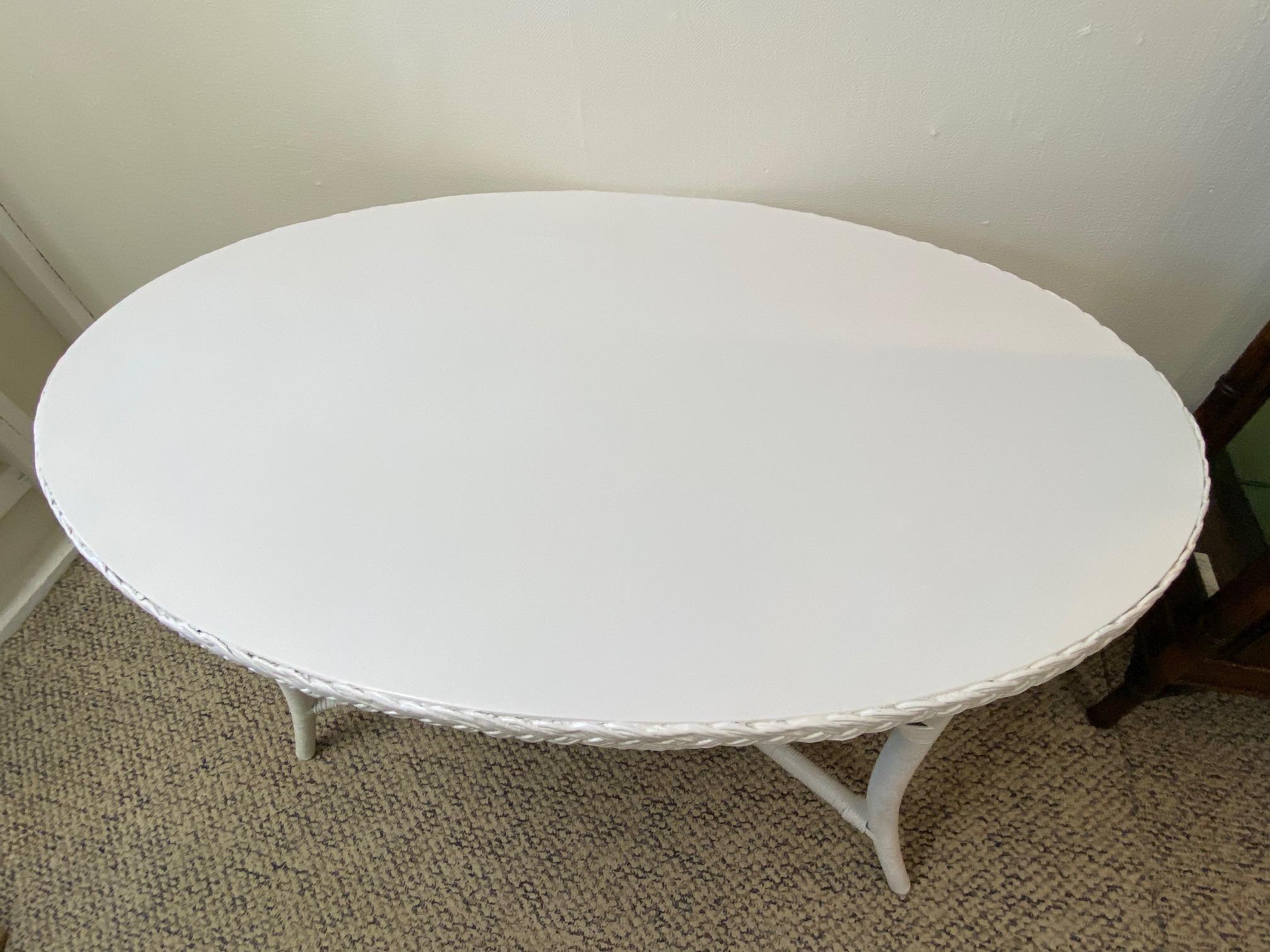 Early 20th Century Vintage American Wicker Company White Painted Oval Dining Table For Sale