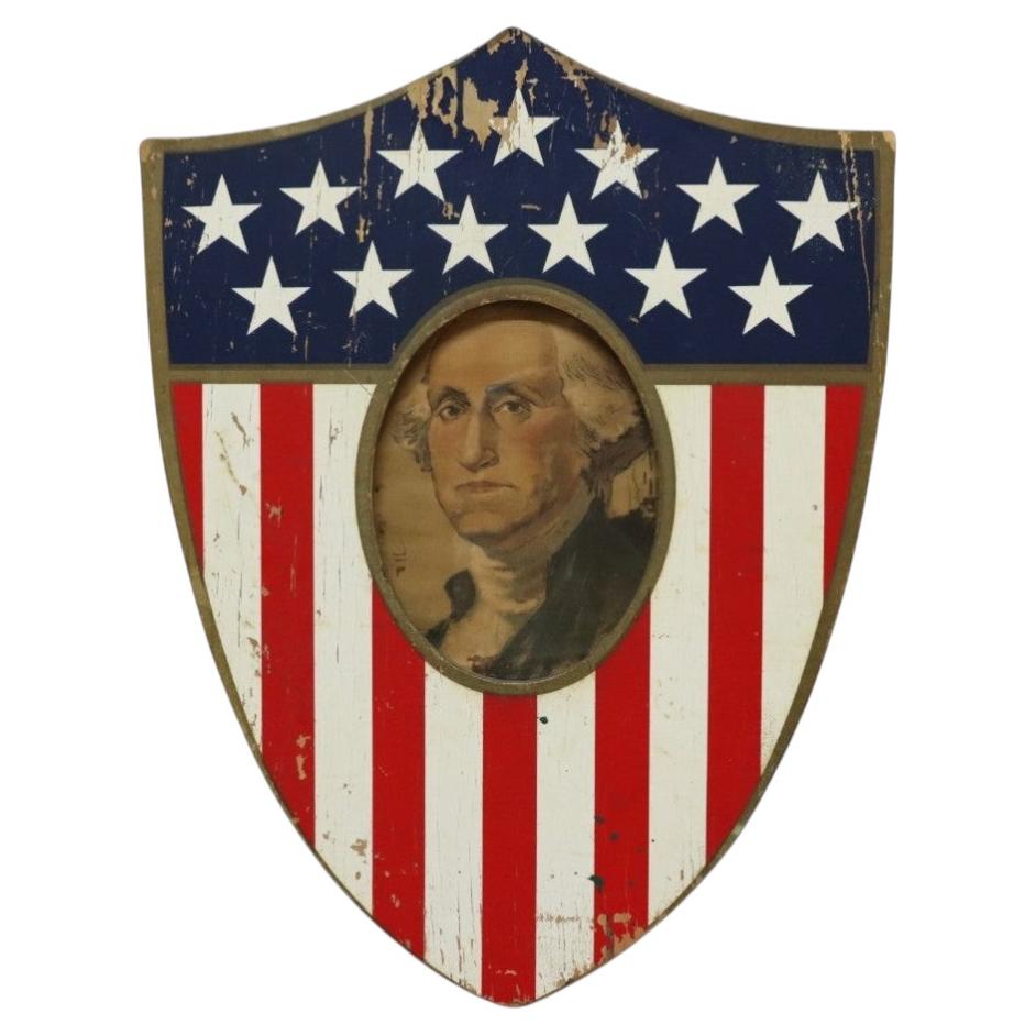 Cornice vintage in legno in stile americano con scudo e ritratto di George Washington tratto dal “Philadelphia Press” del 1904