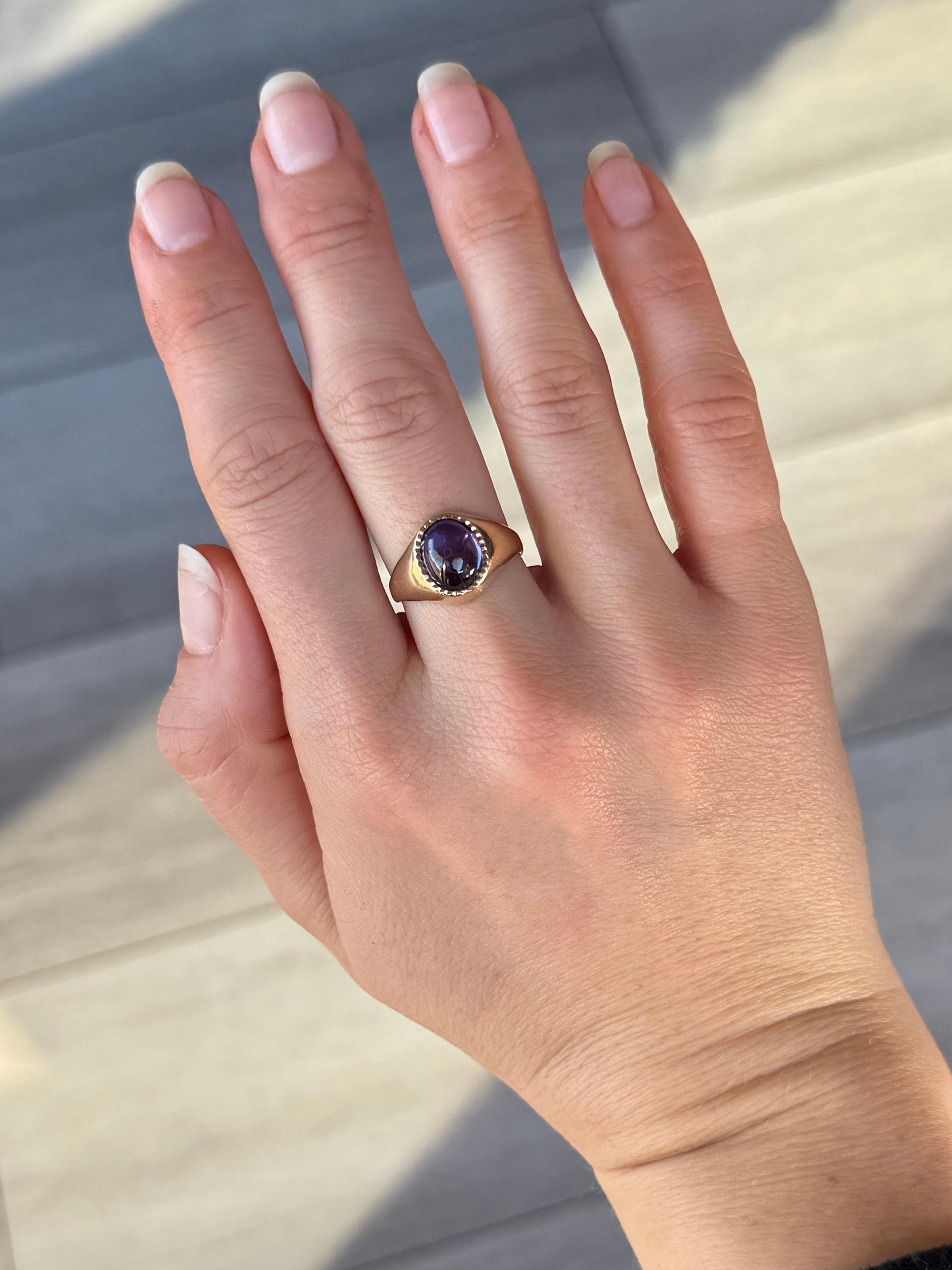 The Amethyst set in this ring is glossy and a blue purple colour. The Amethyst is oval in shape. The chunky and ornate shank is modelled in 9 carat gold.

Ring Size: N or 6 3/4 
Stone Dimensions: 9x7

Weight: 3