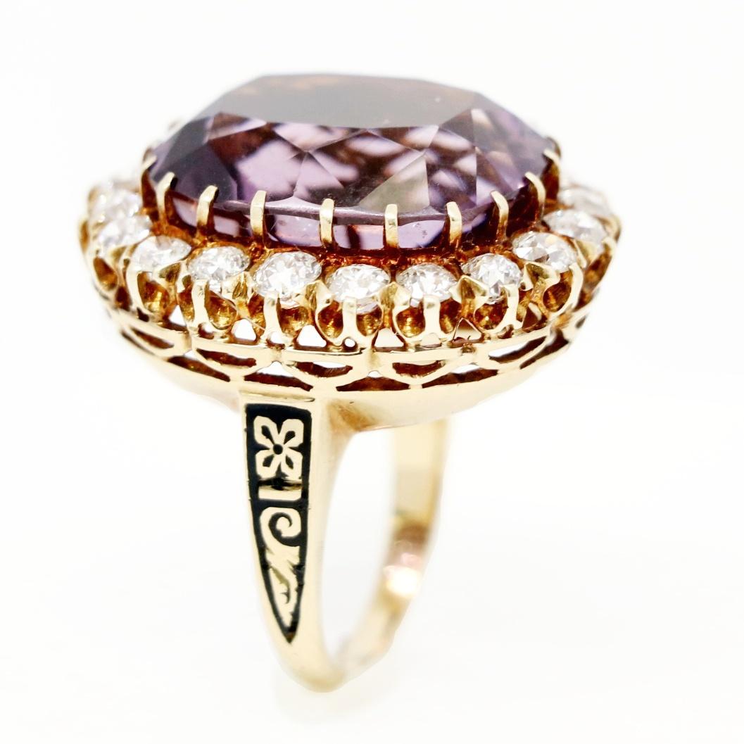 This Vintage 14K Yellow Gold Ring Has Halo Of 20 Old Mine Cut Diamonds Approximately 2.00 Carats Total Weight With A Beautiful Amethyst In the Center. The Shoulders Of The Ring Have A Black Enamel Design.